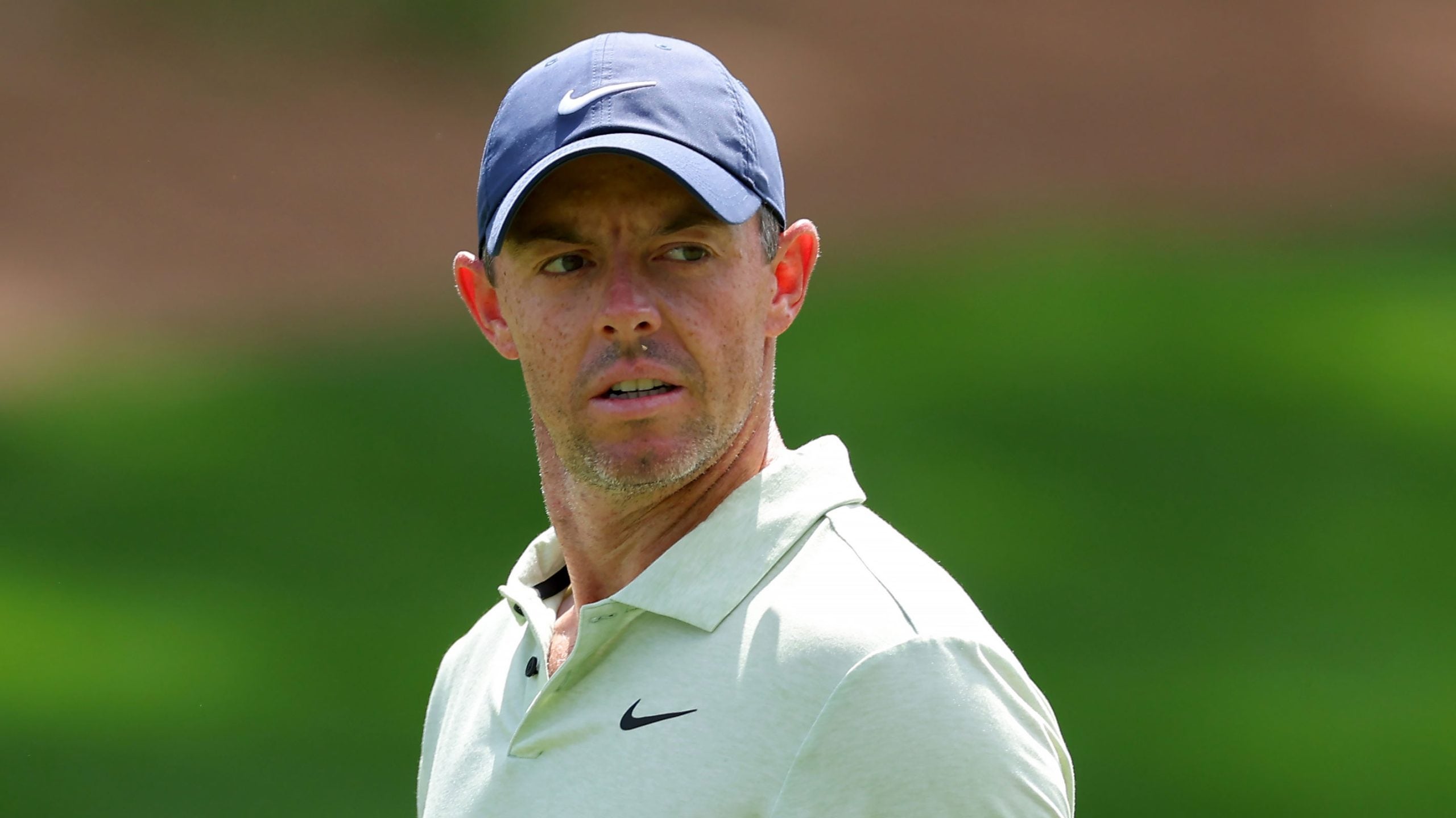 Rory McIlroy walking down fairway at players championship sunday