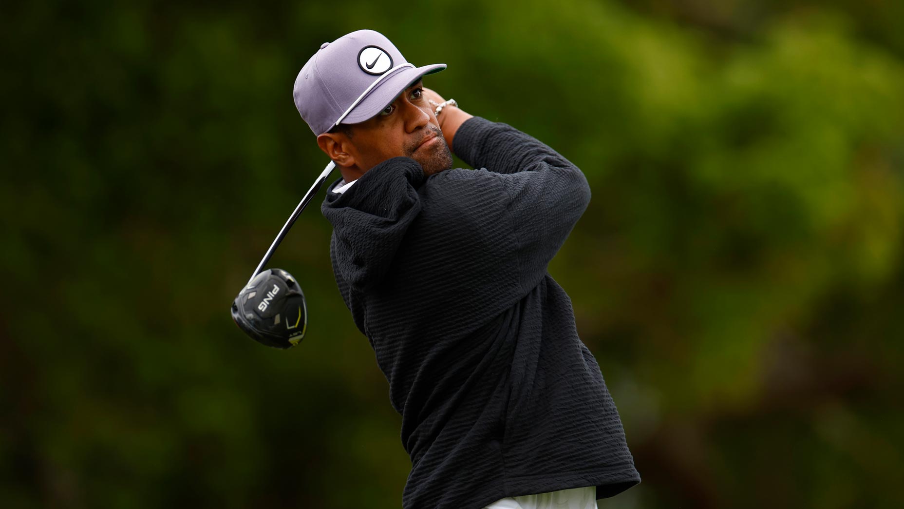 Tony Finau holds swing finish after shot at 2024 Vaslpar Championship