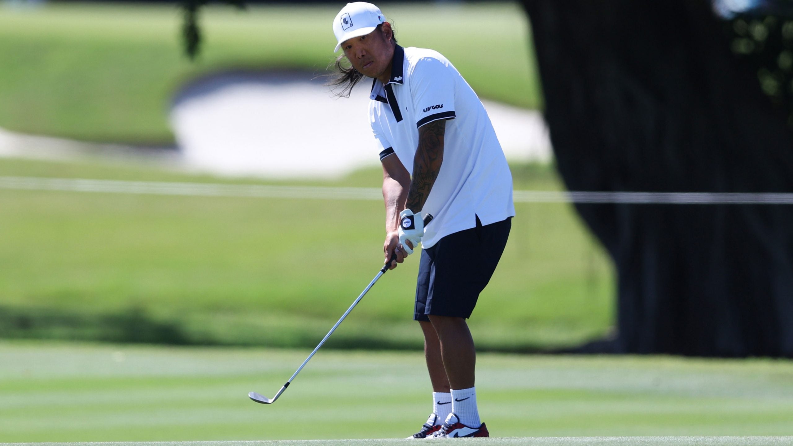 Anthony Kim plays a shot on the third hole during day one of the LIV Golf Invitational - Miami at Trump National Doral Miami
