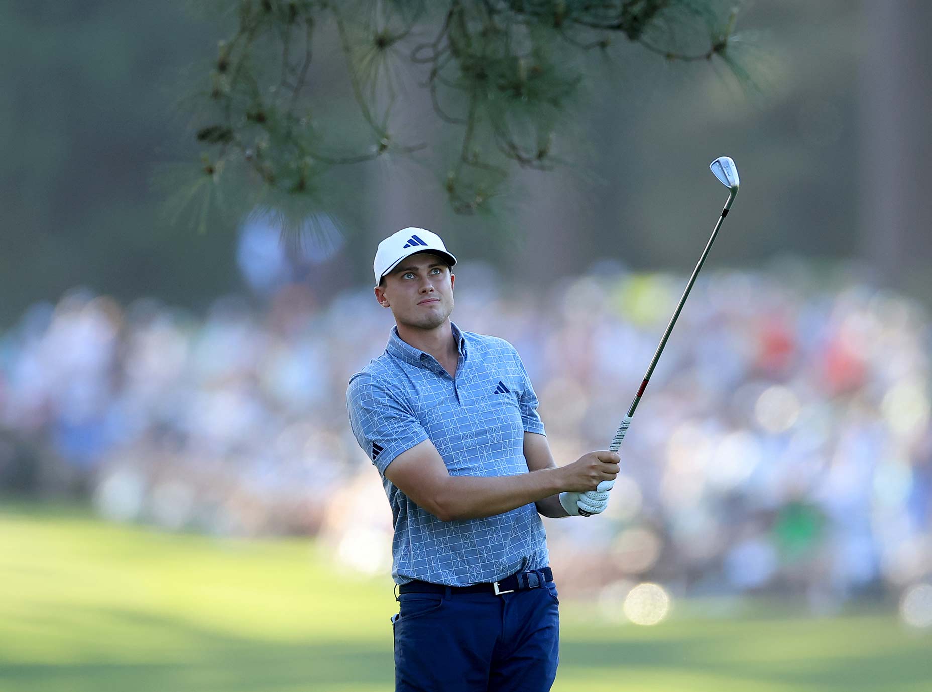 Ludvig Aberg watches his shot at the Masters.