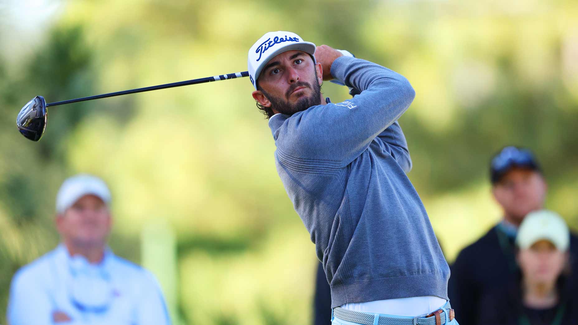 Max Homa hits driver during 2024 Masters