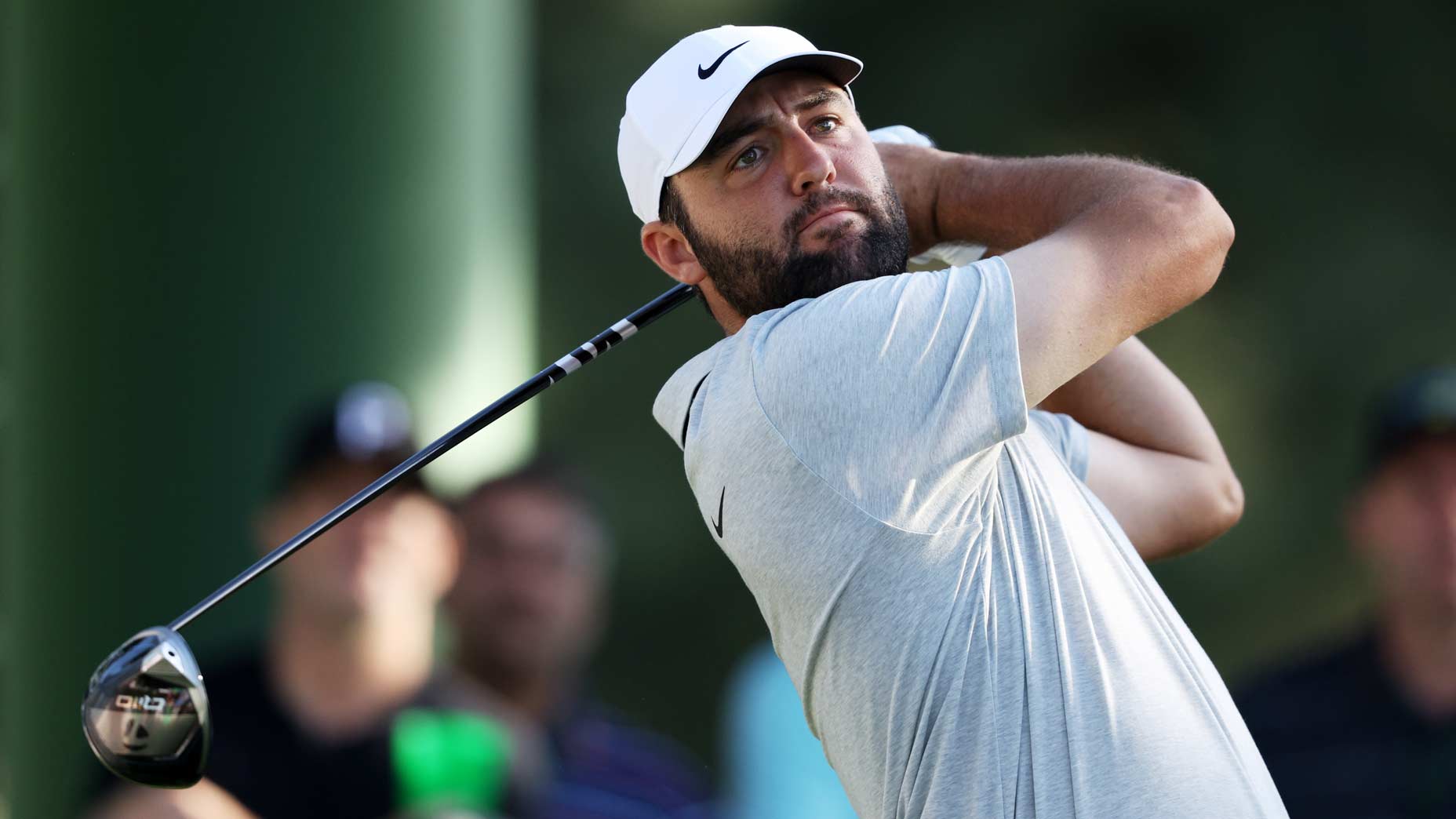Pro golfer Scottie Scheffler hits drive at 2024 Masters