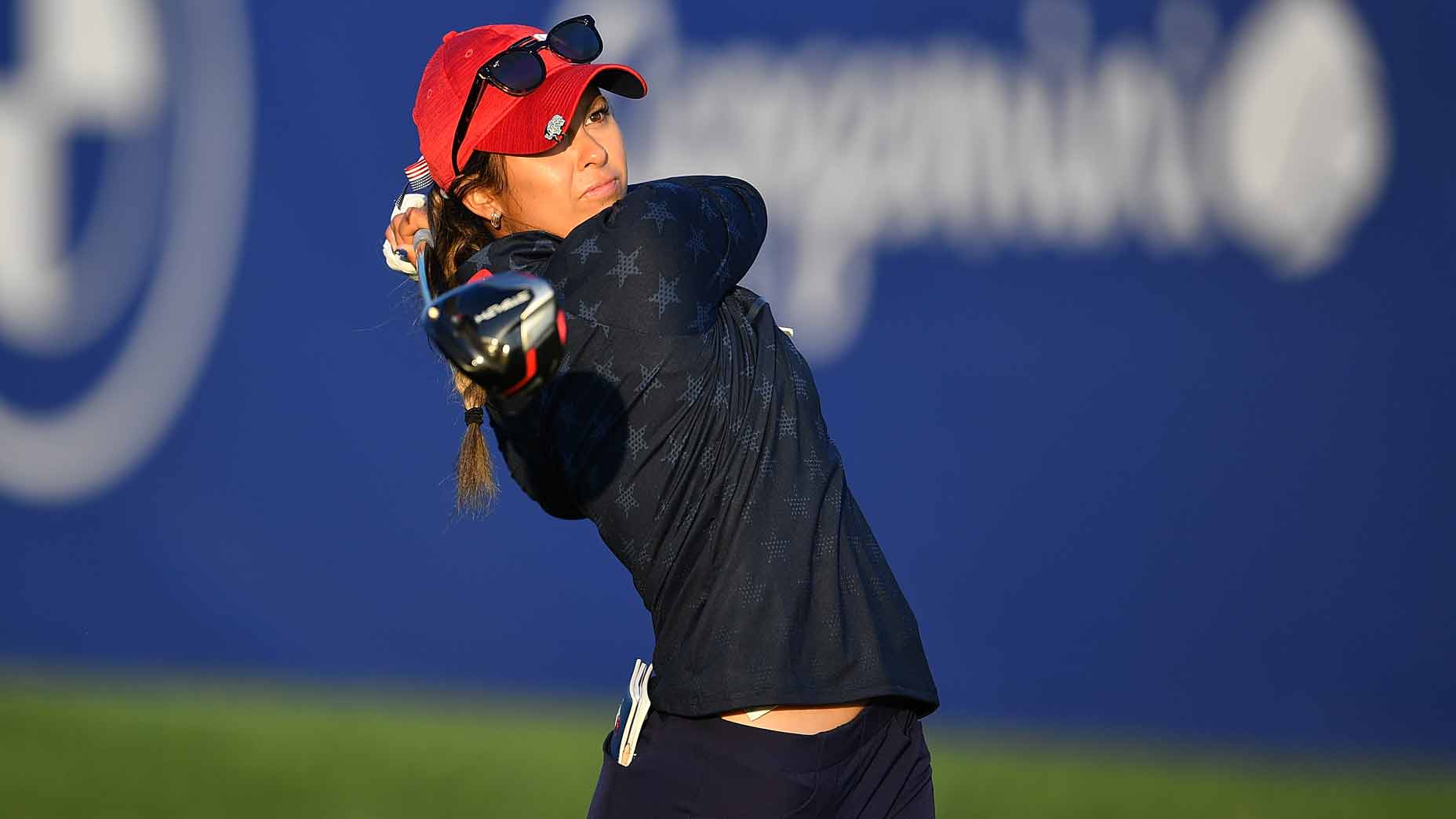 yana wilson hits a tee shot during the 2023 junior solheim cup