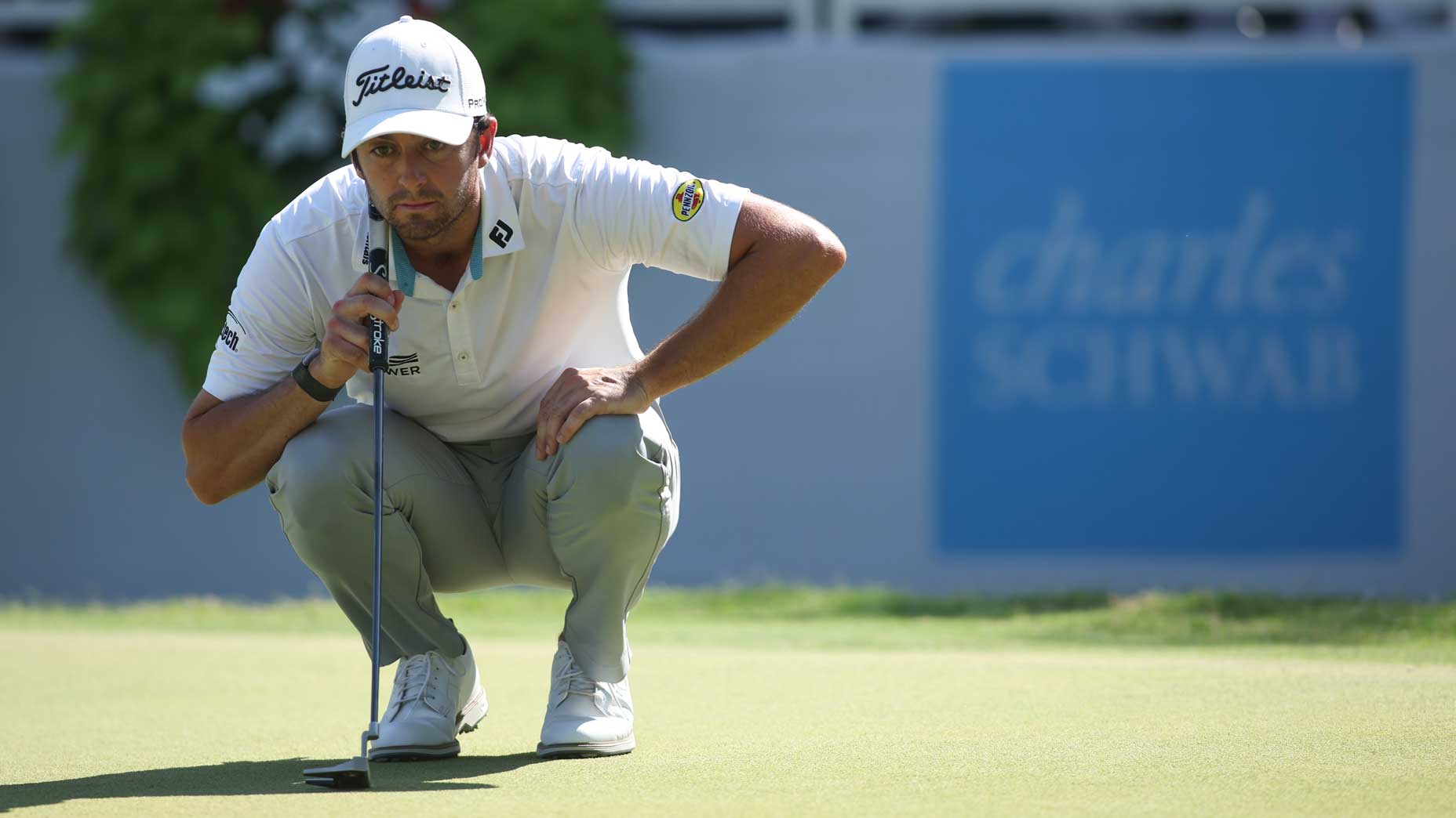 Davis Riley reads a putt at the Charles Schwab Championship.
