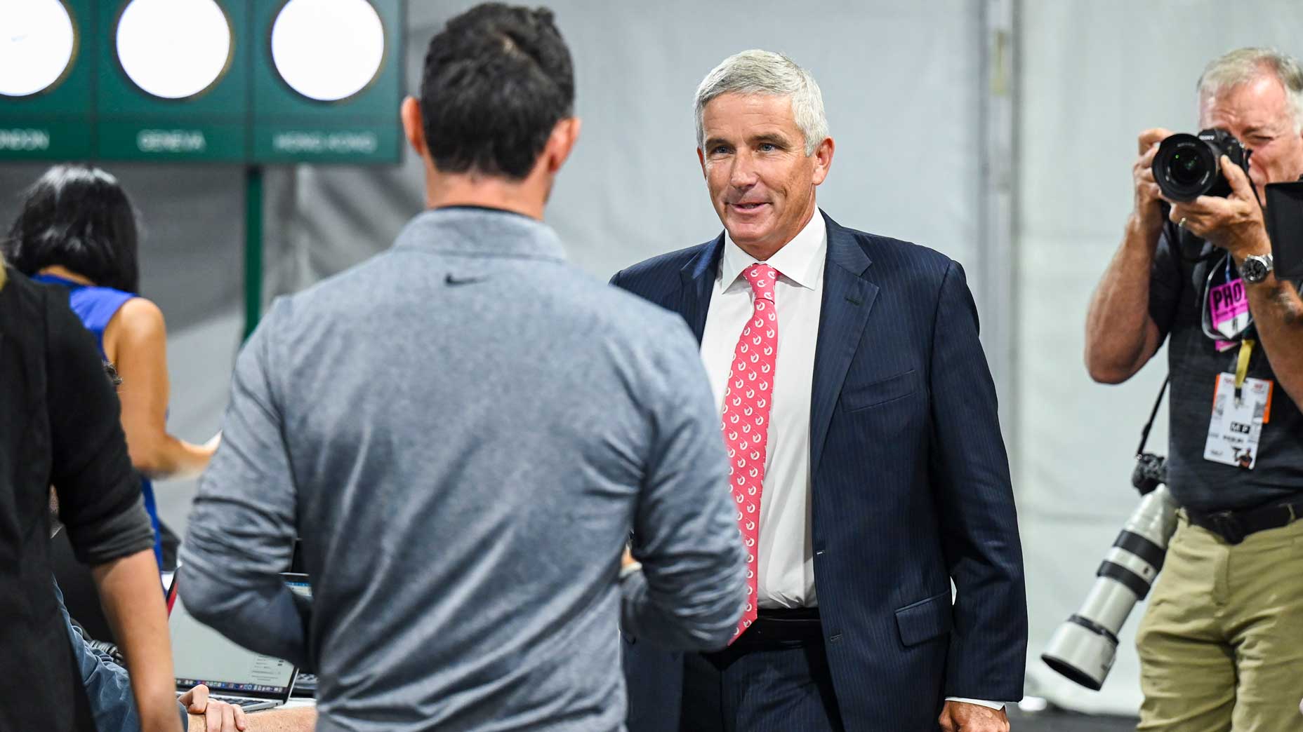 Rory McIlroy and Jay Monahan.