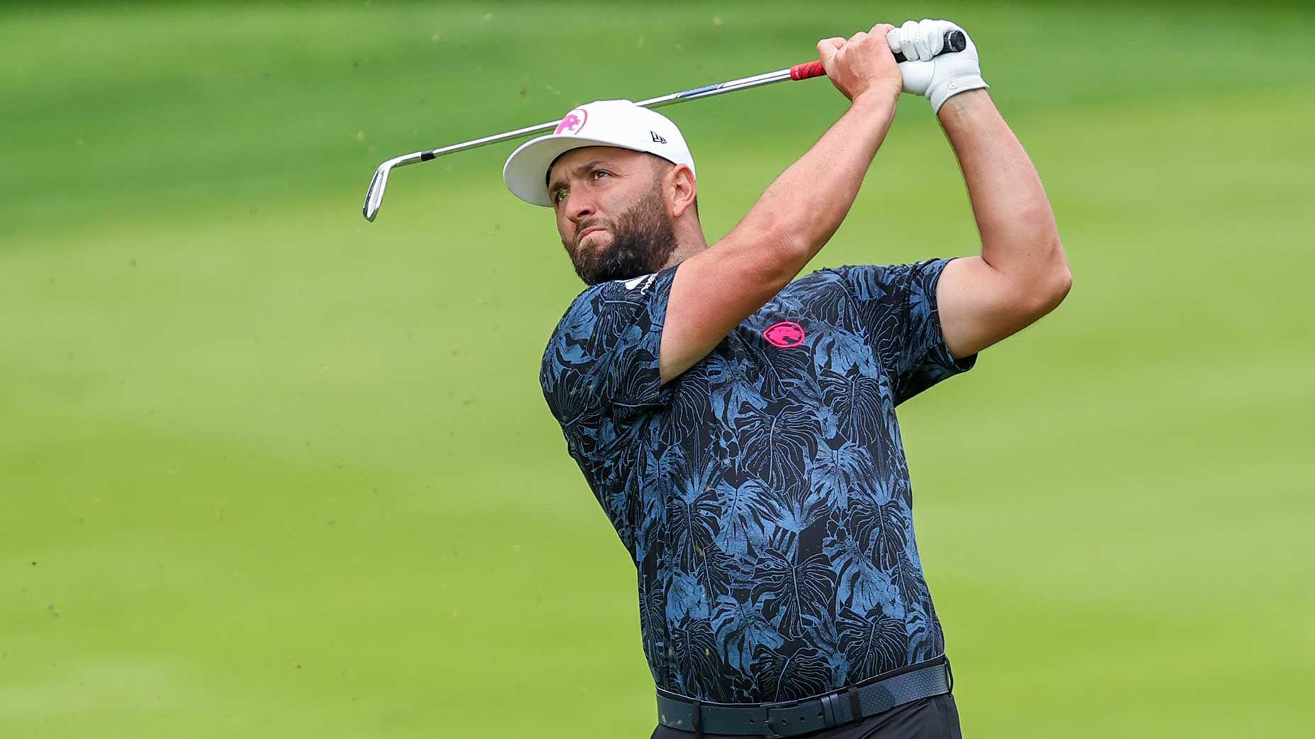 jon rahm hits a shot during the pga championship