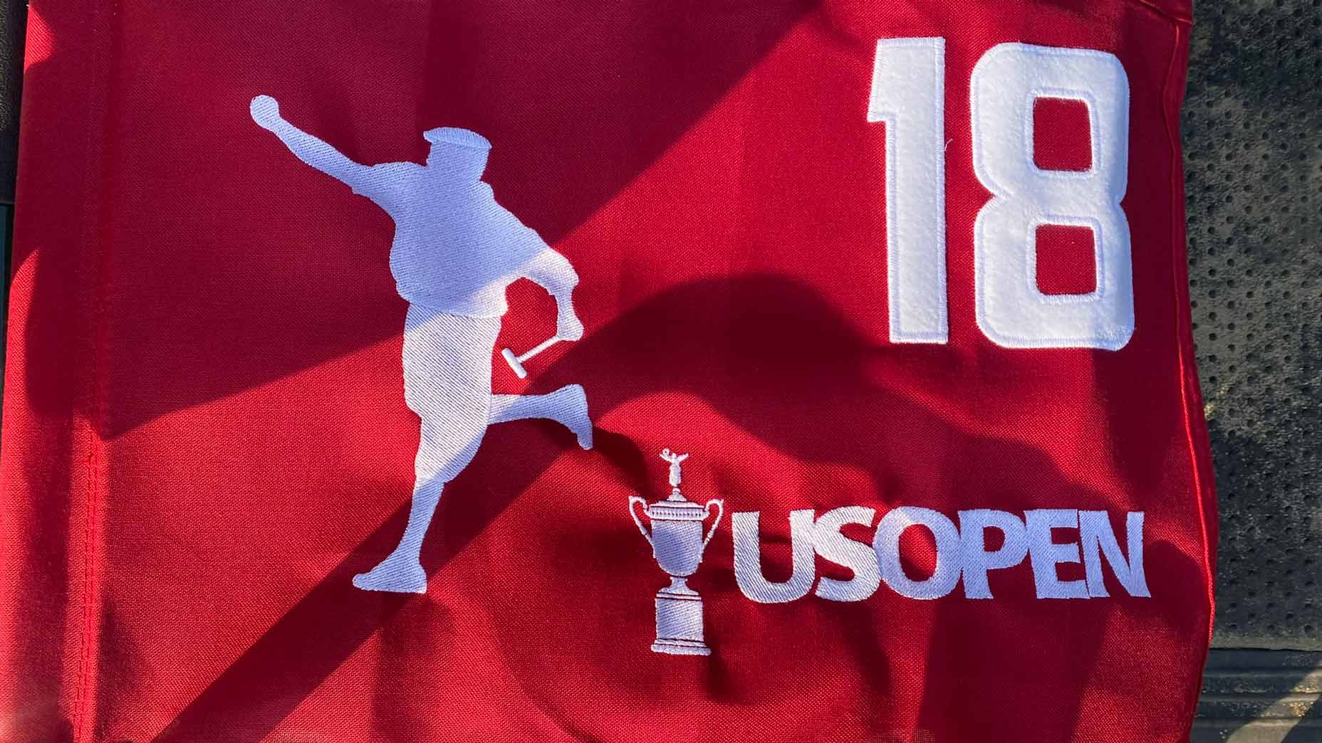 The flag on the 18th hole Sunday at the U.S. Open honors Payne Stewart.