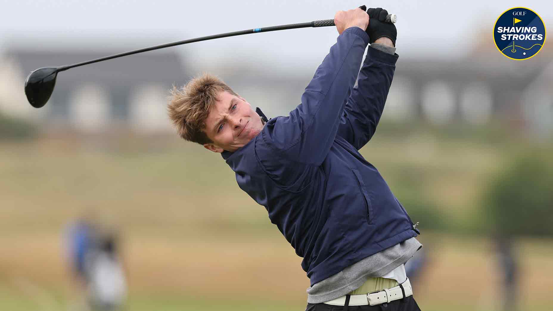 Pro golfer hits drive during tournament