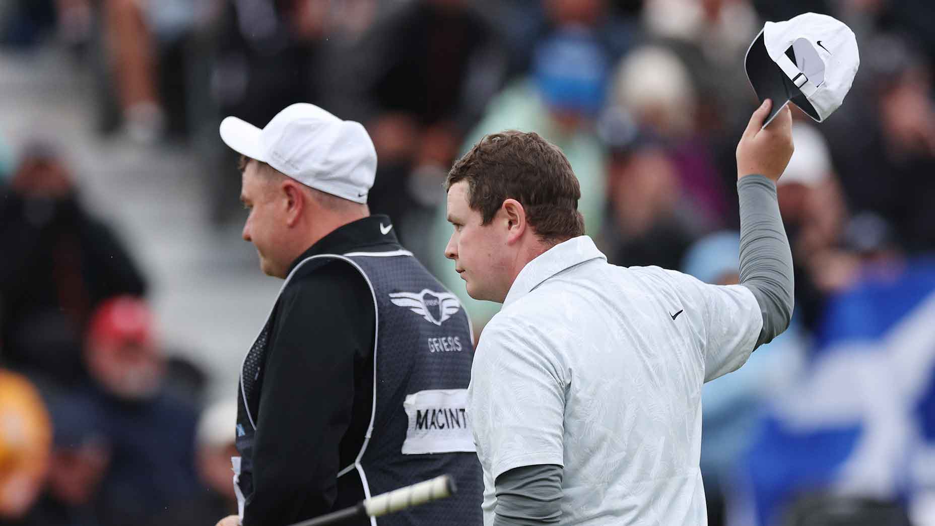 Bob MacIntyre waves hat at Genesis Scottish Open in white shirt