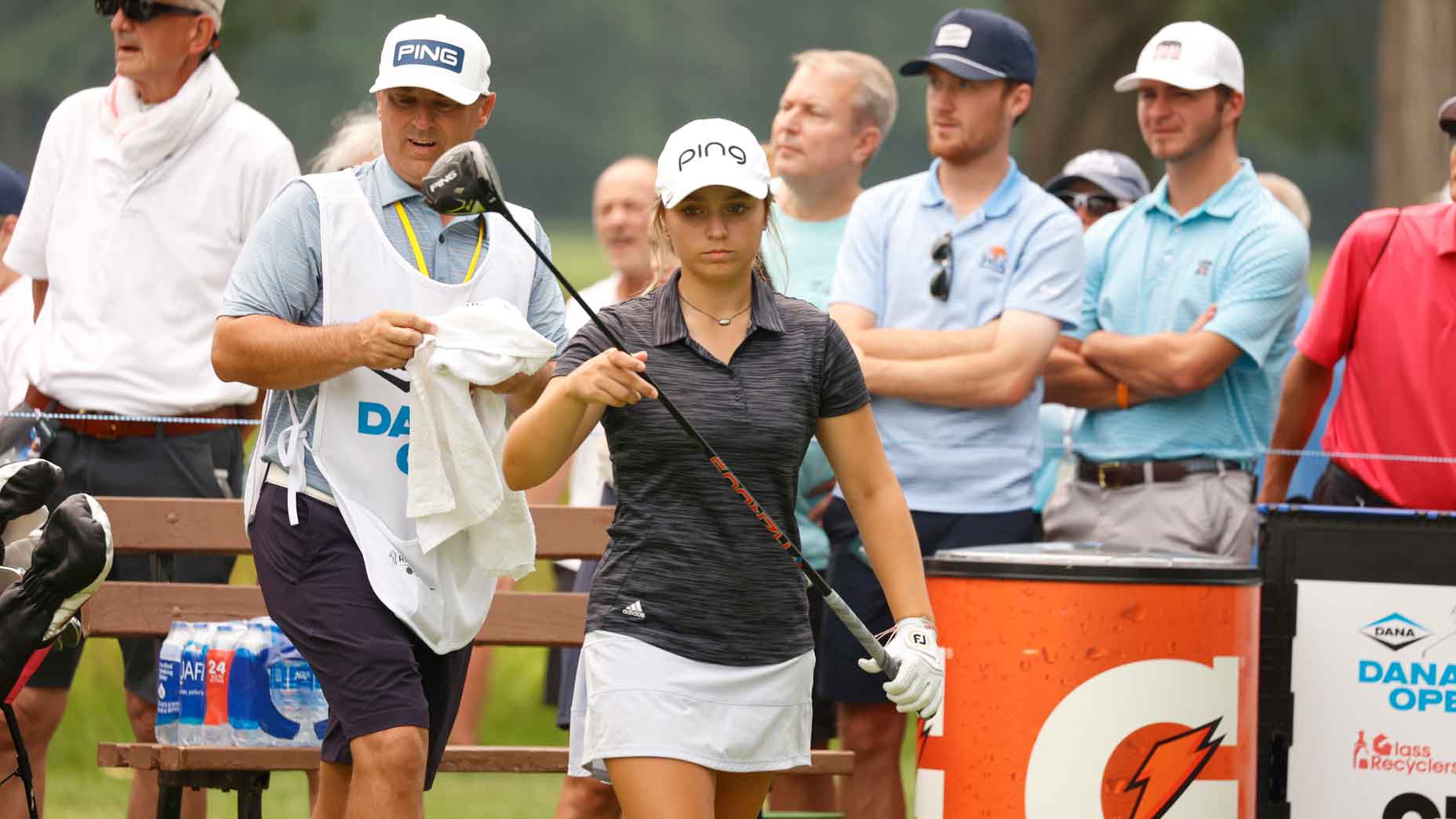 ifteen year old amateur golfer Mia Hammond with her father as her caddie gets ready to hit her tee shot on the 13th hole during her final round of the Dana Open on July 16, 2023, at Highland Meadows Golf Club in Sylvania, Ohio.