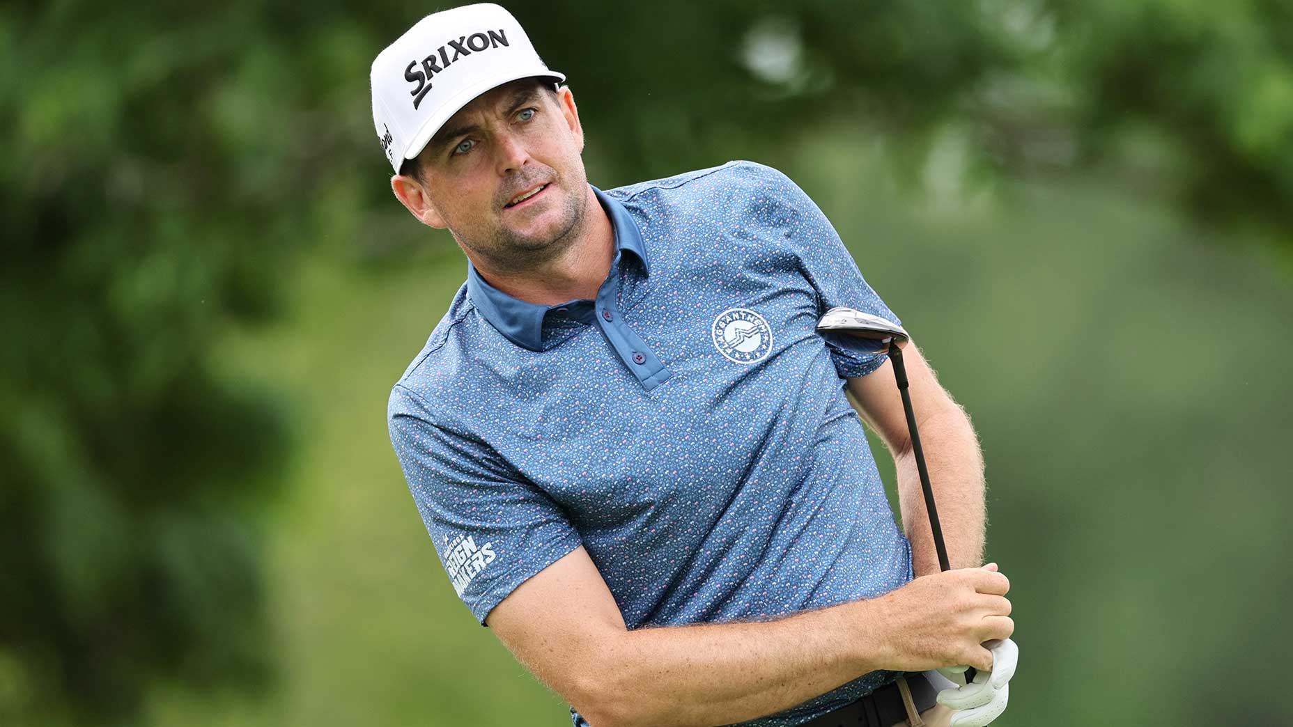 Keegan Bradley watches a shot during a golf tournament