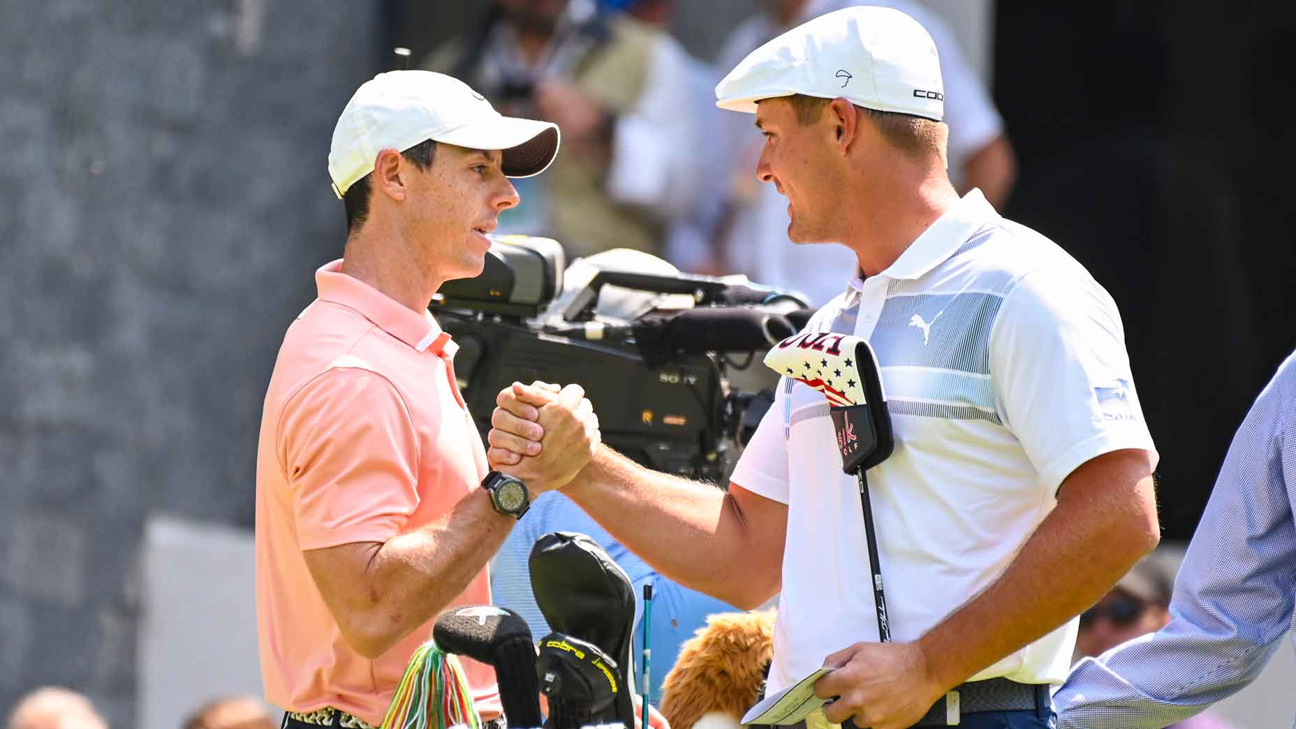 Rory McIlroy of Northern Ireland and Bryson DeChambeau shake hands before teeing off in the final round of the World Golf Championships-Mexico Championship at Club de Golf Chapultepec on February 23, 2020 in Mexico City, Mexico.