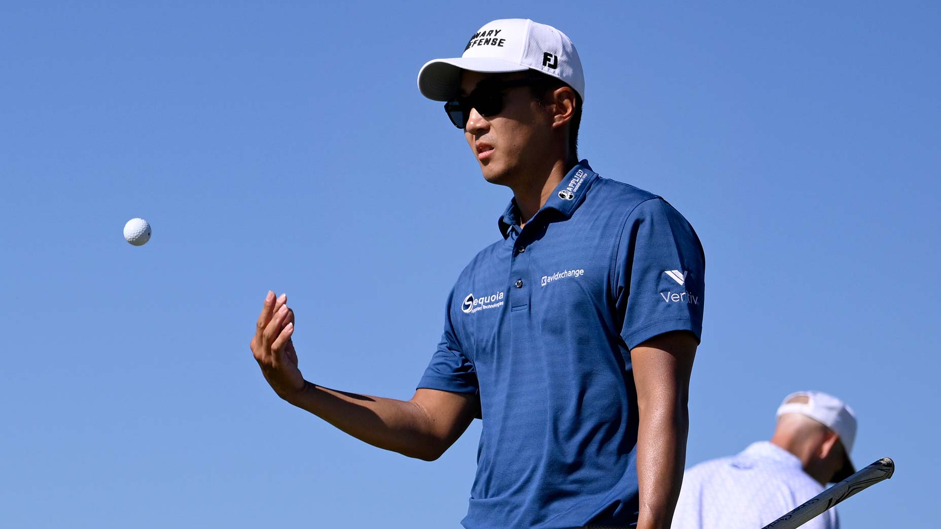 PGA Tour pro Michael Kim tosses his ball on the 13th green during the second round of the World Wide Technology Championship 2024 at El Cardonal at Diamante.