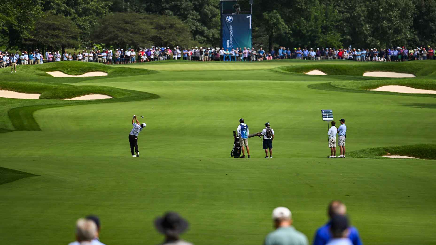 Olympia Fields CC scenic shot of sungjae Im hitting down first fairway