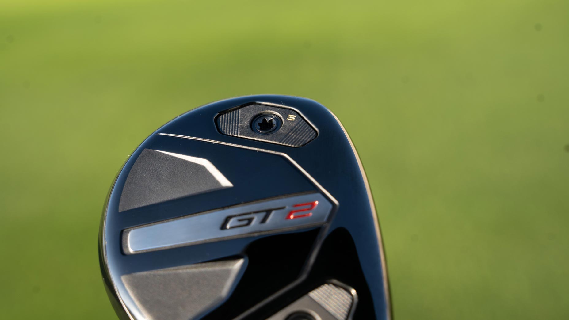 The weight port on a Titleist GT2 hybrid.
