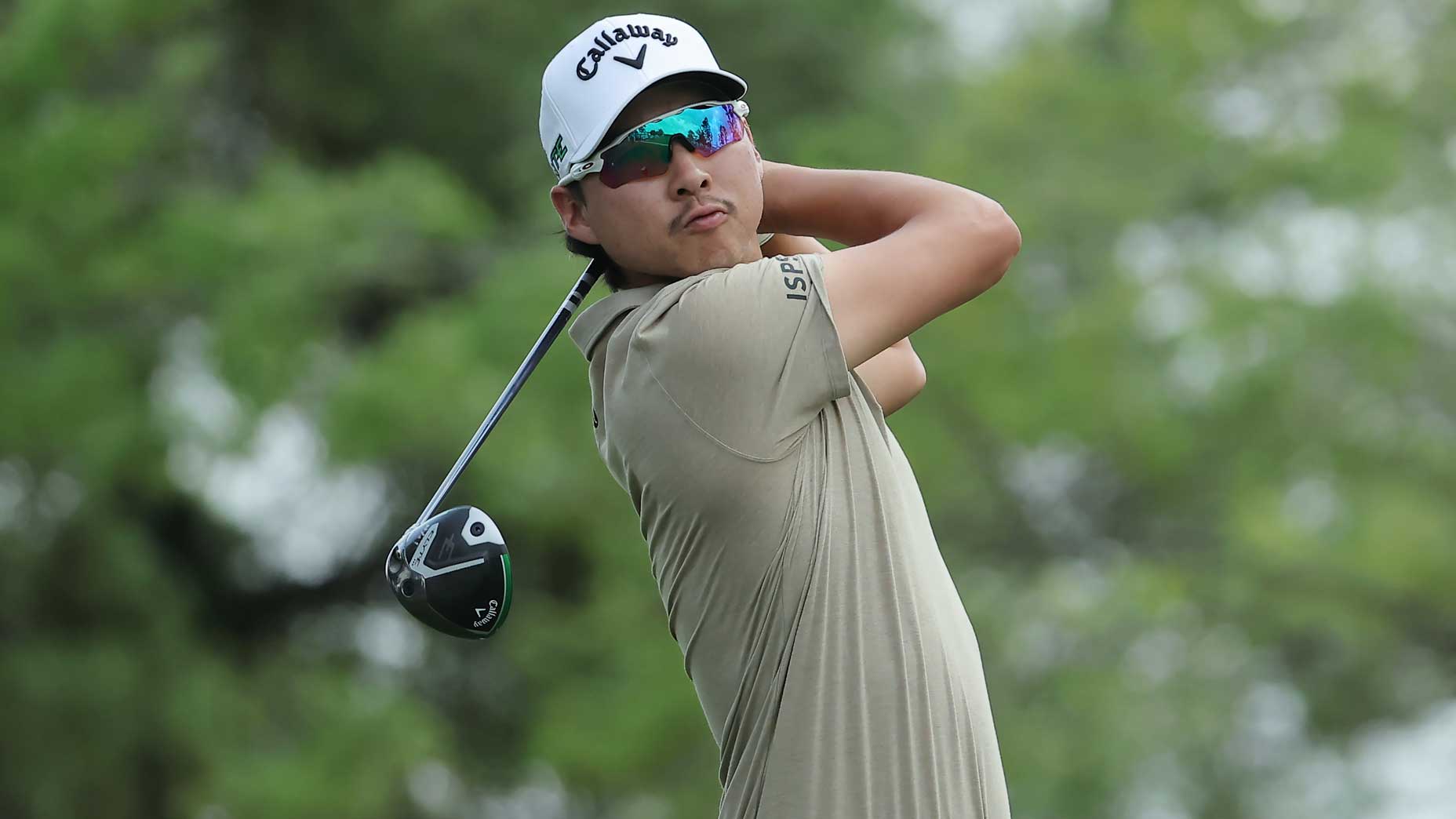PGA Tour pro Min Woo Lee hits his tee shot on the 12th hole during the third round of the Texas Children's Houston Open 2025 at Memorial Park Golf Course.