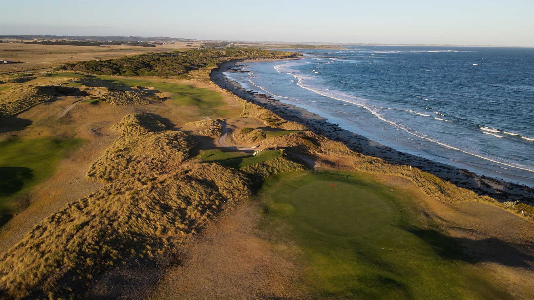 an overhead shot of the 12th green at port fairy golf club.