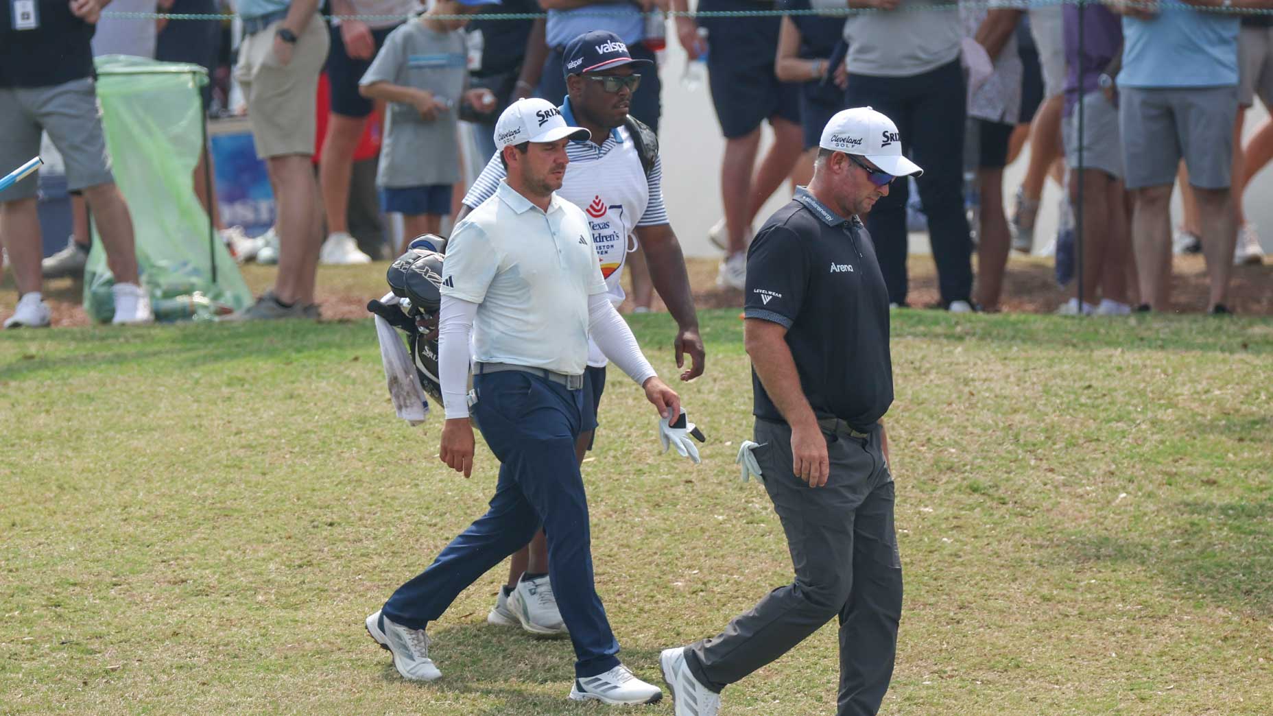 alejandro tosti walks at the Houston Open