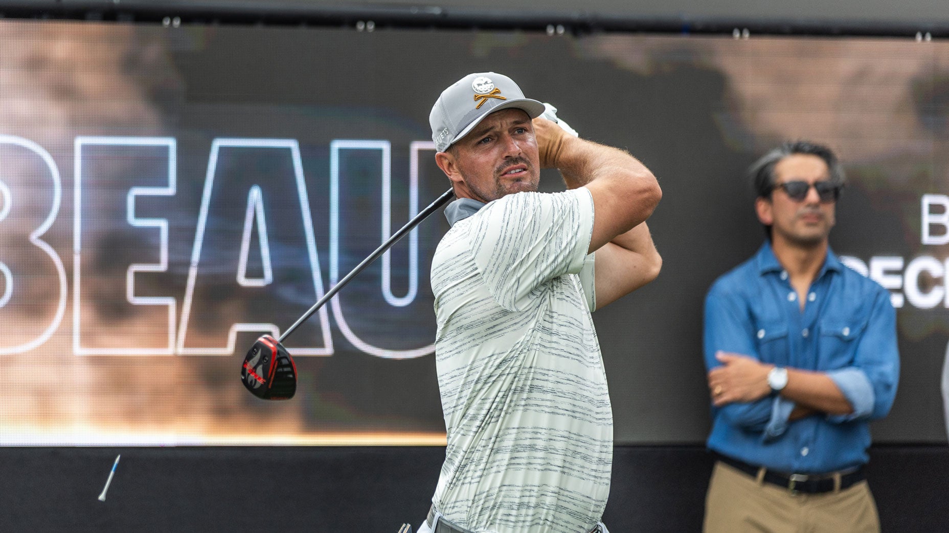 Bryson DeChambeau hits a drive on the first hole of LIV Golf Miami