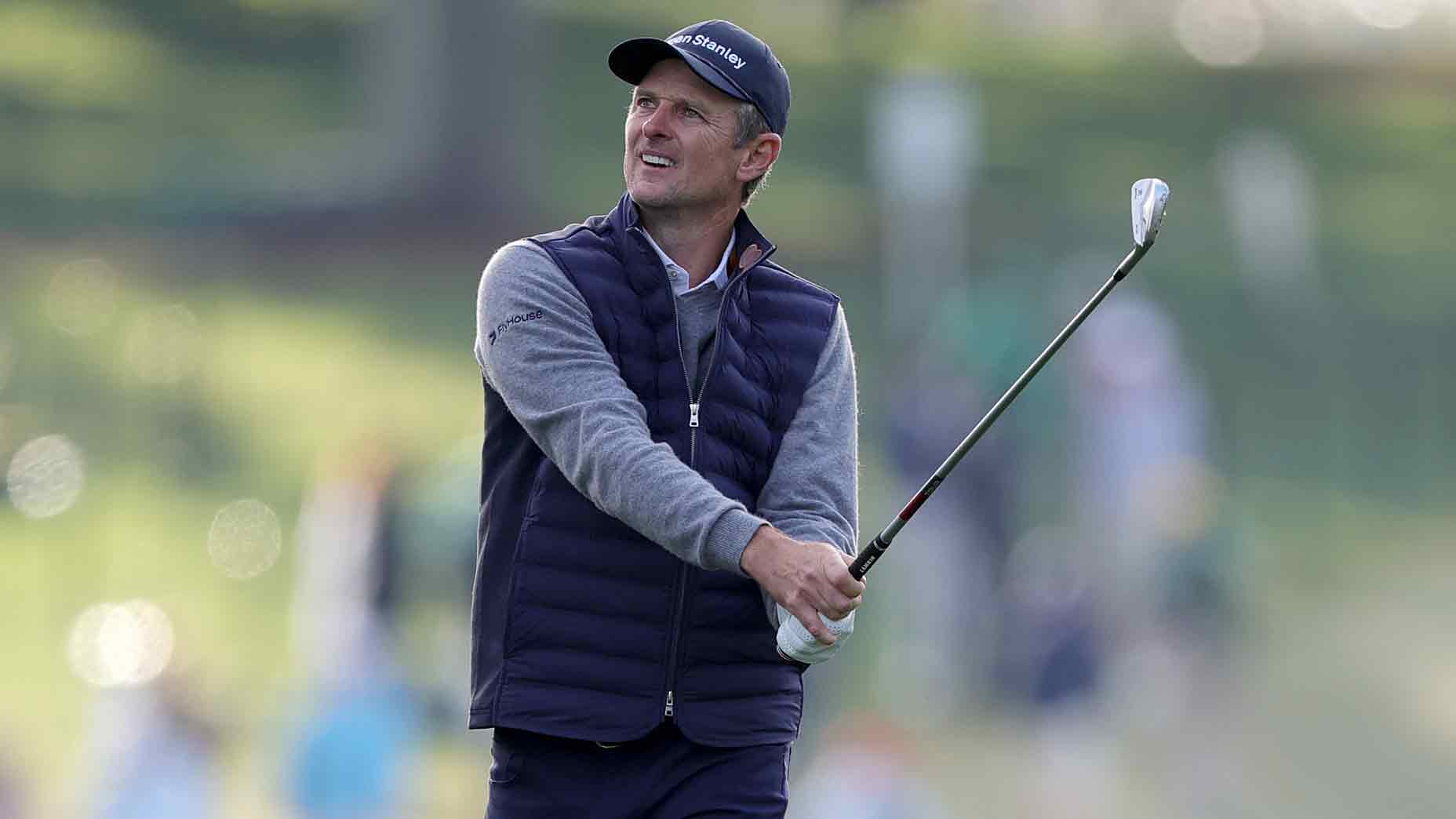 Justin Rose hits a shot with one of his Miura irons.