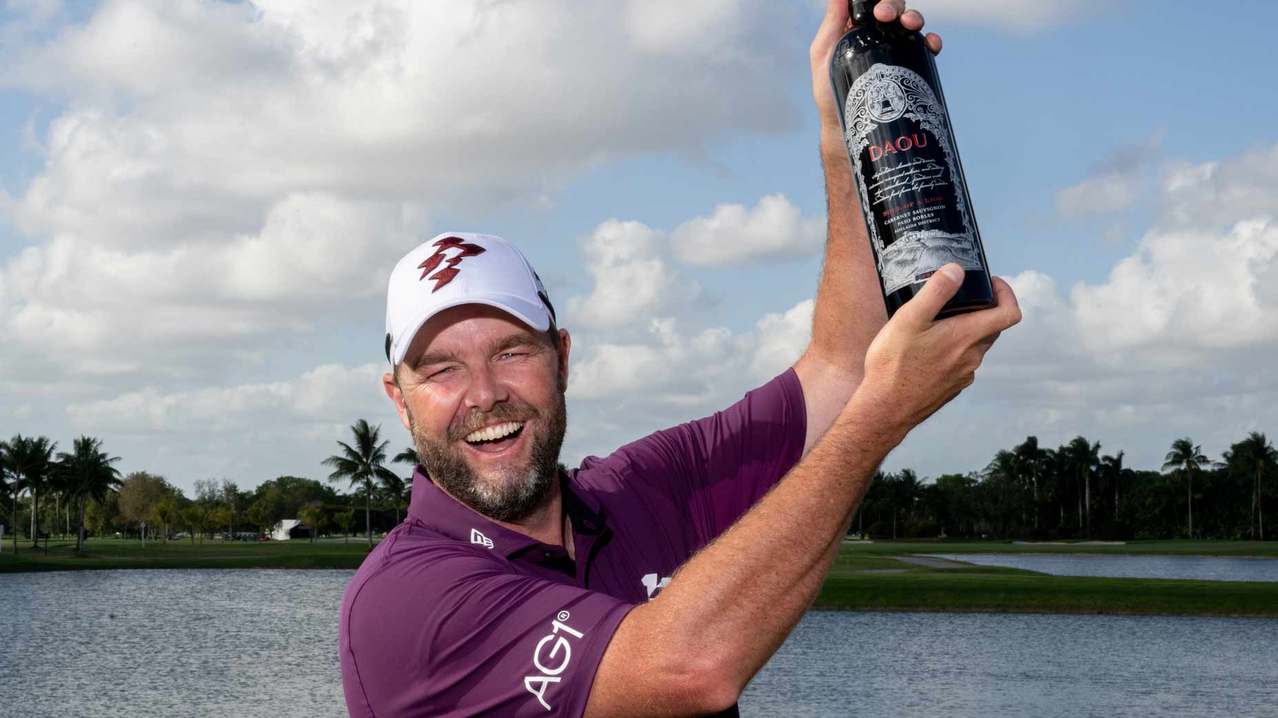 First place individual champion, Marc Leishman of Ripper GC poses with DAOU wine after the final round of LIV Golf Miami at Trump National Doral on Sunday, April 06, 2025 in Miami, Florida.