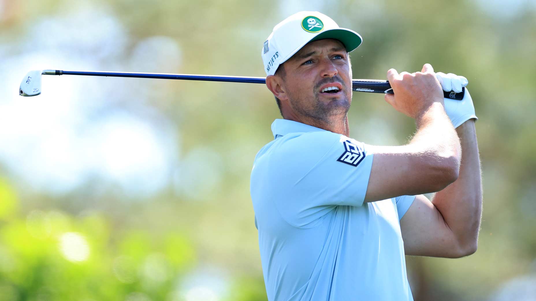 Bryson DeChambeau, who will be a star of the 2025 Masters Saturday TV coverage, tees off during the second round at Augusta National Golf Club.