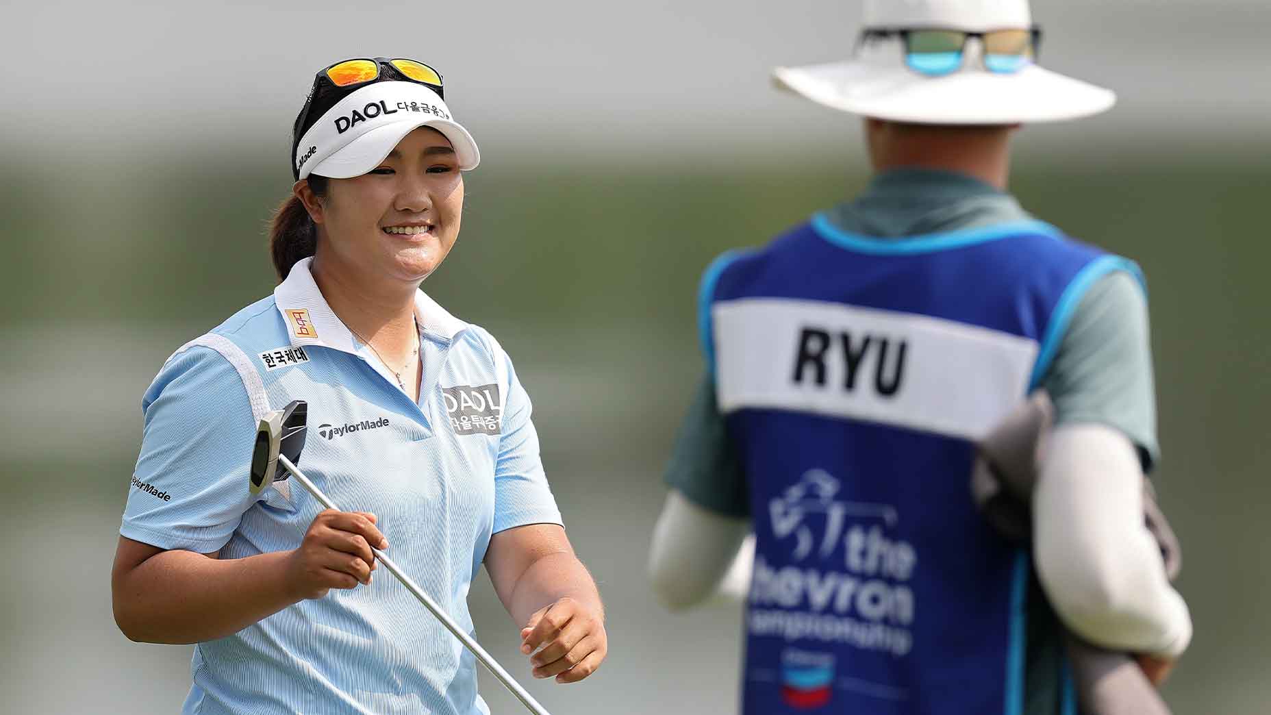 Haeren Ryu smiles at the Chevron Championship while holding putter