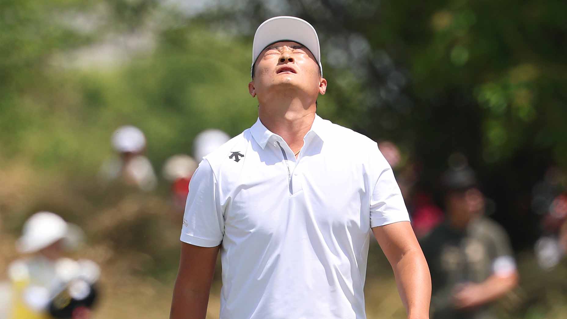 Haotong Li reacts to a shot during the final round of the Volvo China Open.
