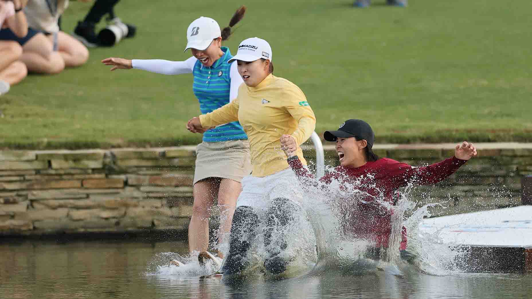 Mao Saigo jumps into the pond on the 18th hole after winning the 2025 Chevron Championship