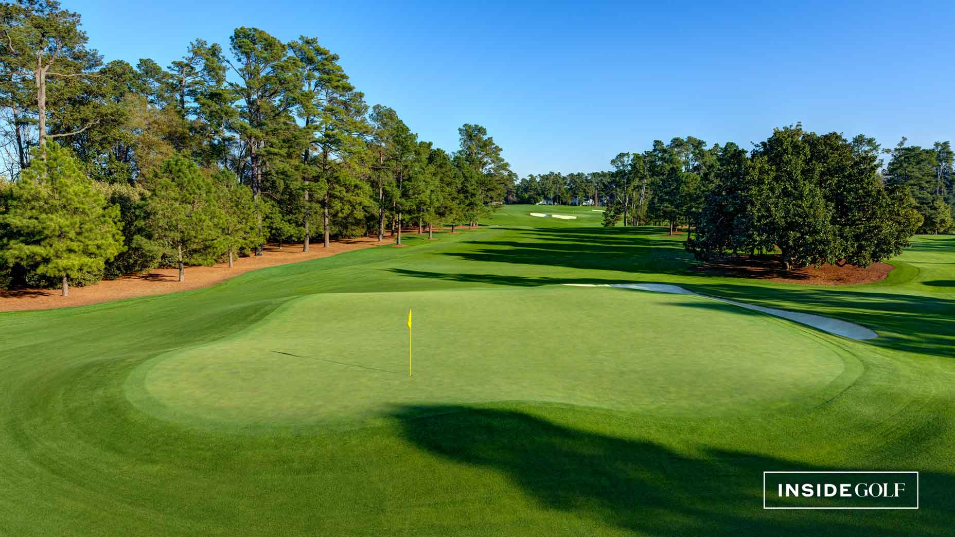 an aerial view of the 1st hole of augusta national golf club
