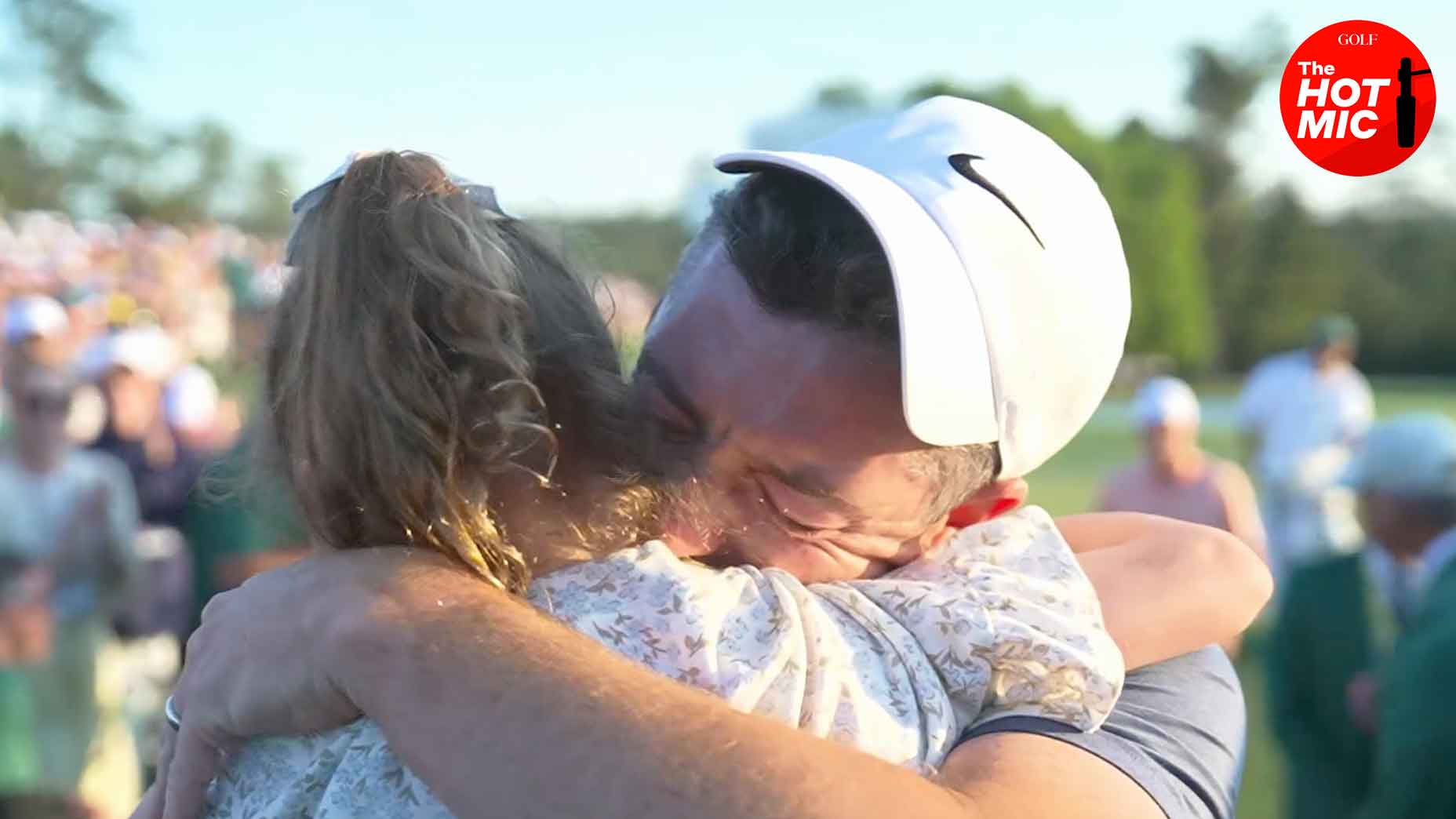 rory mcilroy hugs daughter poppy off the 18th green at augusta national