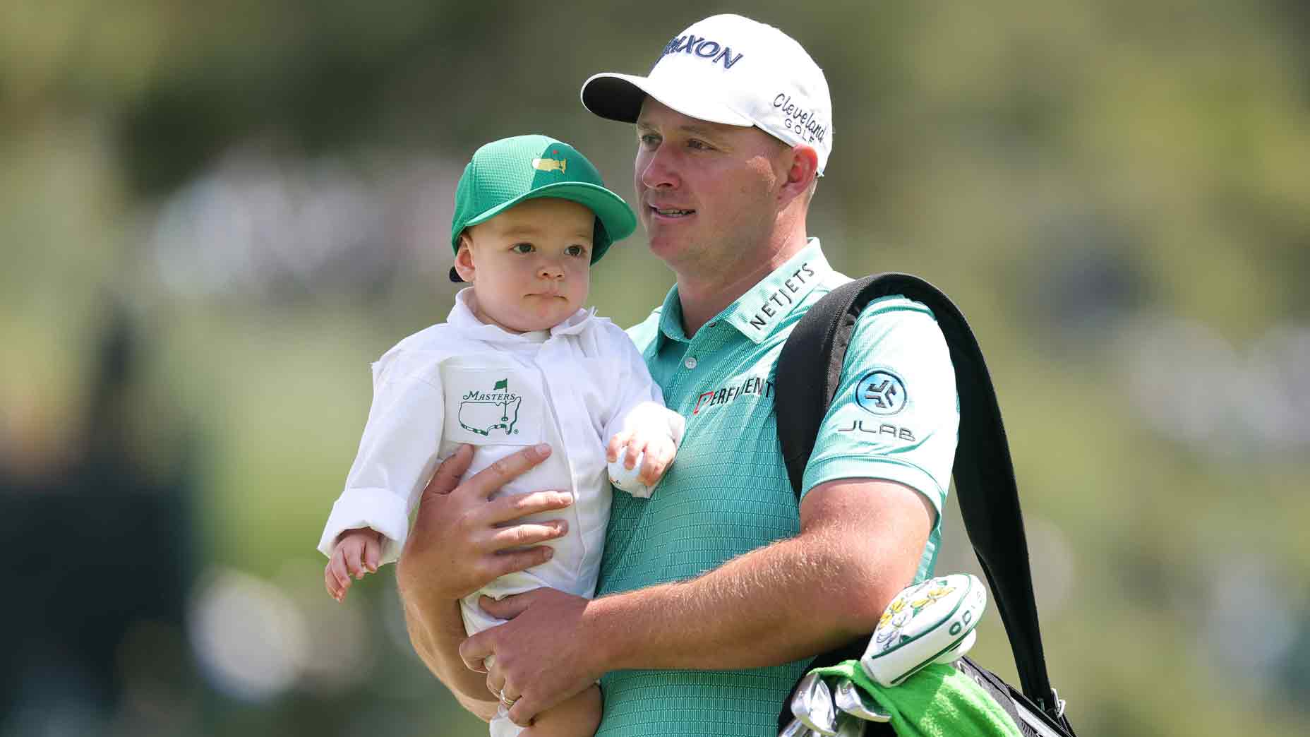 Sepp Straka of Austria holds son Leo on the second hole during the Par Three Contest prior to the 2025 Masters Tournament at Augusta National Golf Club on April 09, 2025 in Augusta, Georgia.