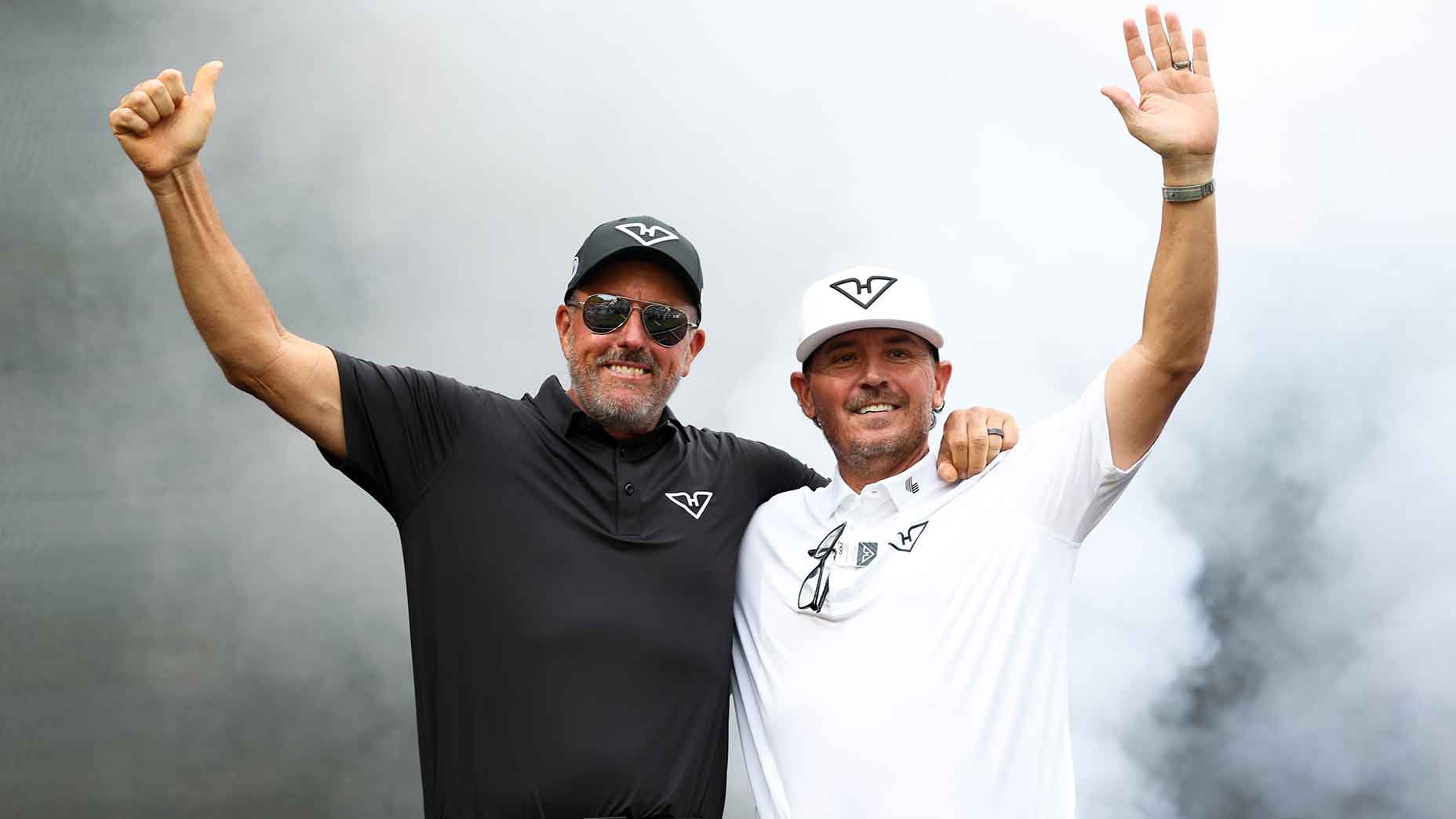 Phil Mickelson and caddie