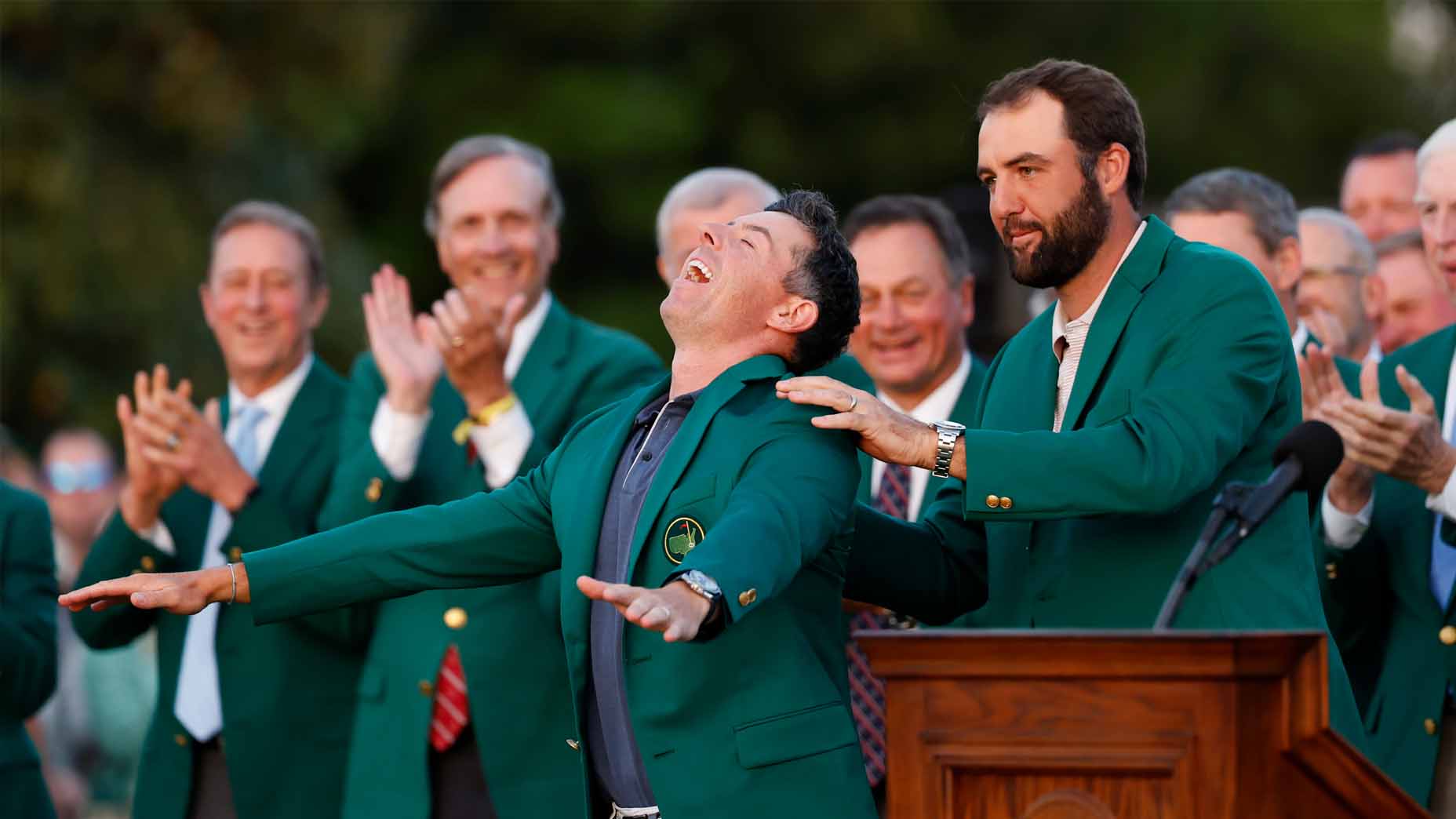 Scottie Scheffler puts the green jacket on Rory McIlroy