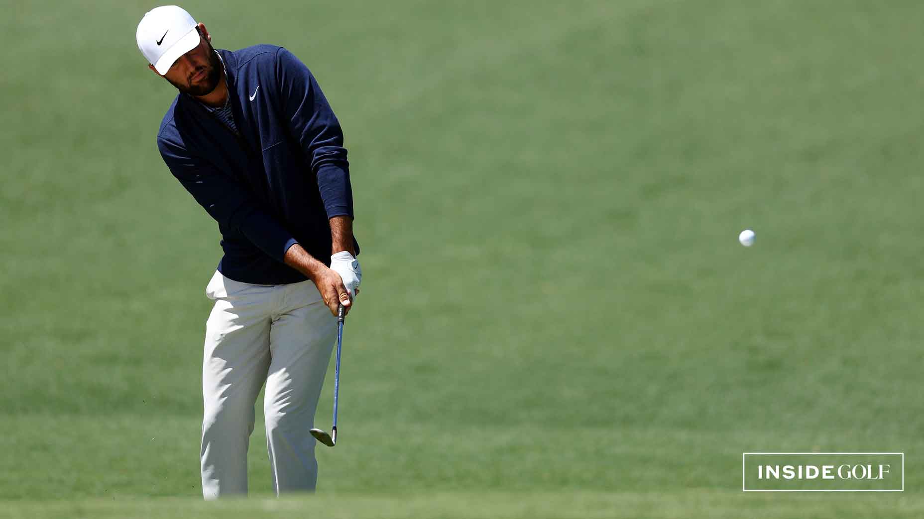 PGA Tour pro scottie scheffler hits a chip shot during the 2024 masters