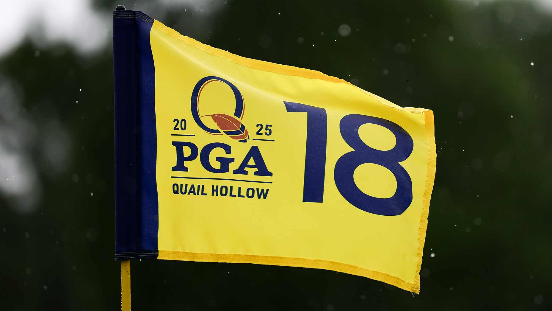 A 2025 PGA Championship flag on the 18th hole at Quail Hollow.
