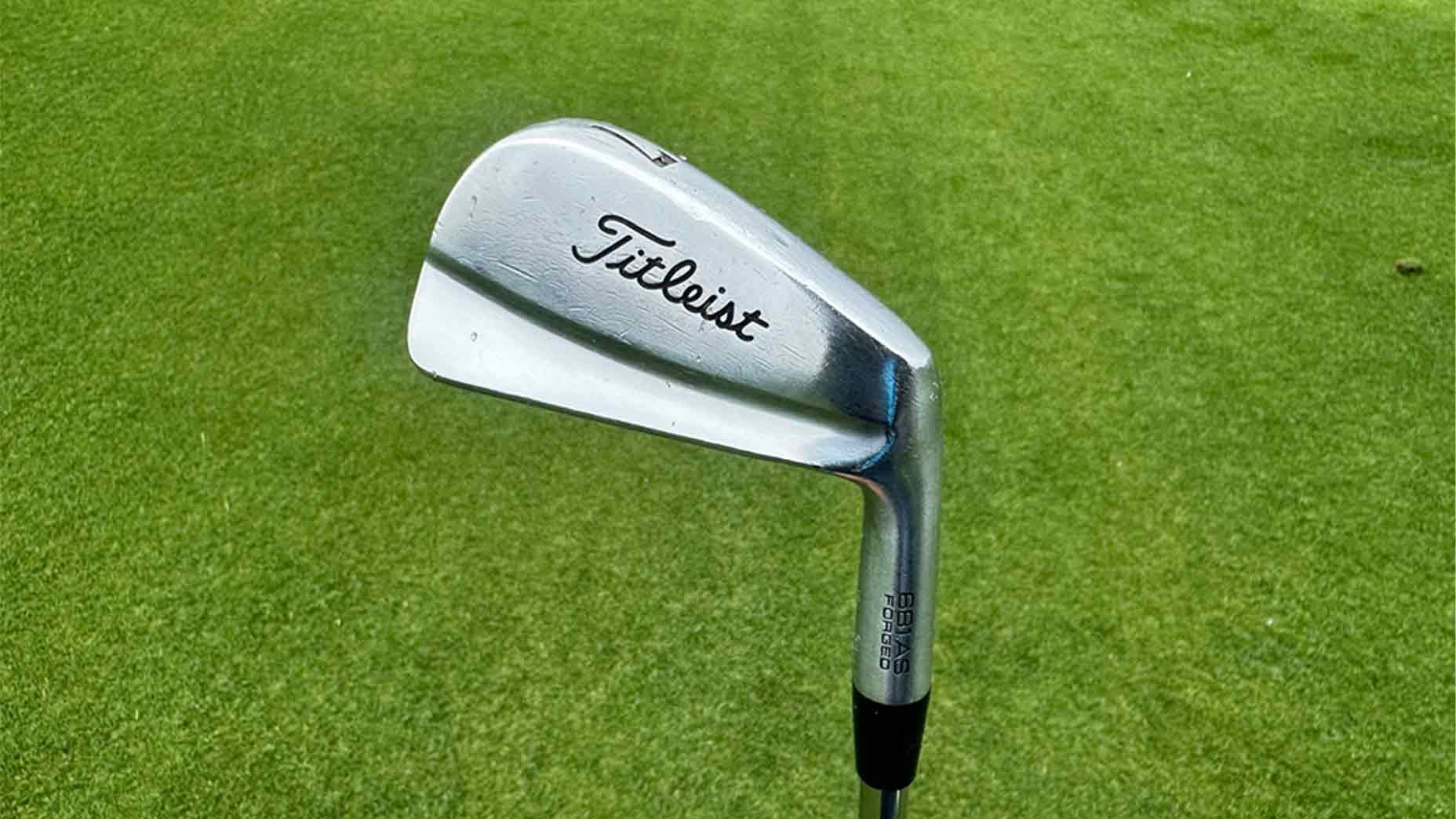 An in-hand photo of Adam Scott's Titleist 681.AS irons at the 2025 PGA Championship.
