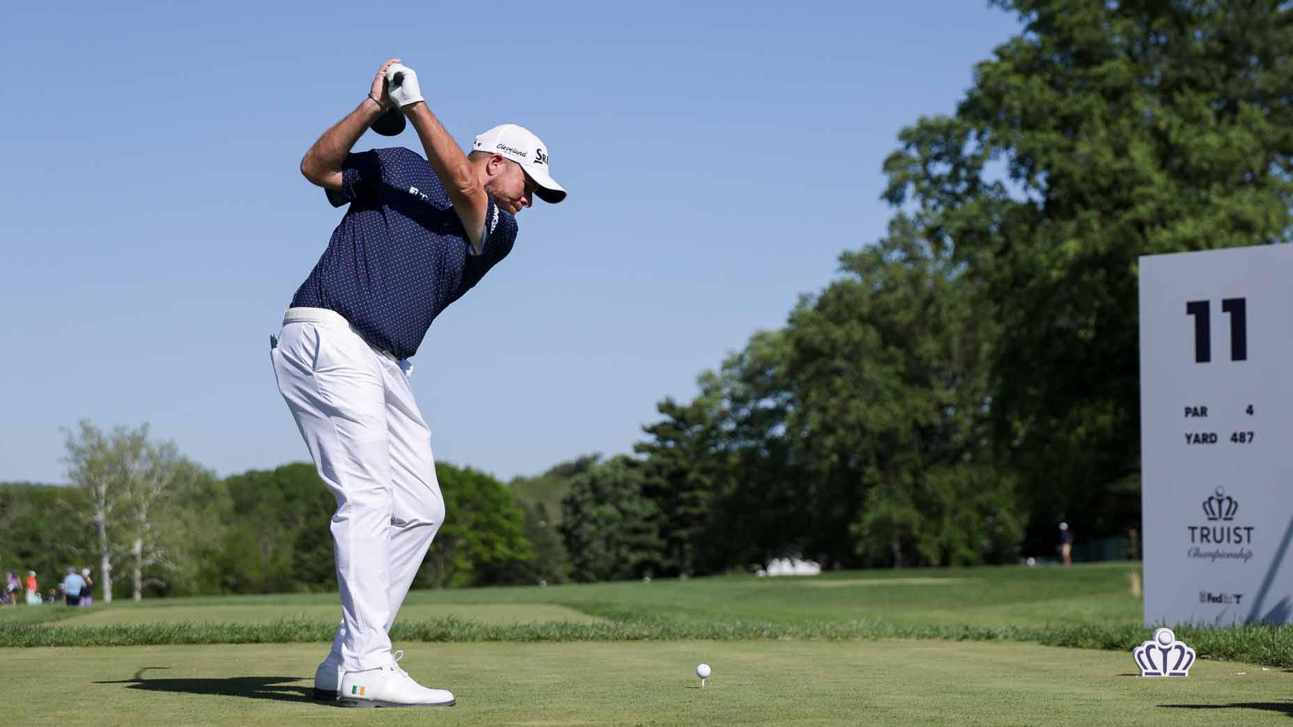 Shane Lowry hits a tee shot at Philadelphia Cricket Club.