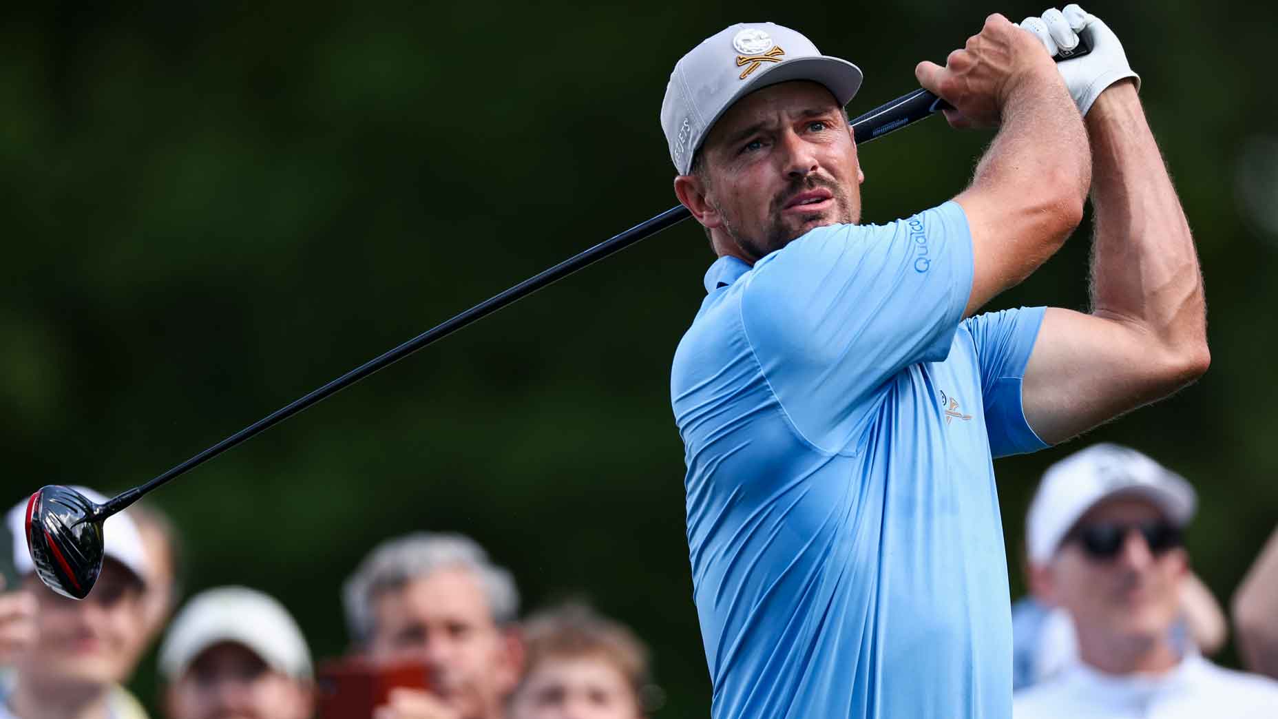 bryson dechambeau hits a tee shot during a practice round for the 2025 pga championship