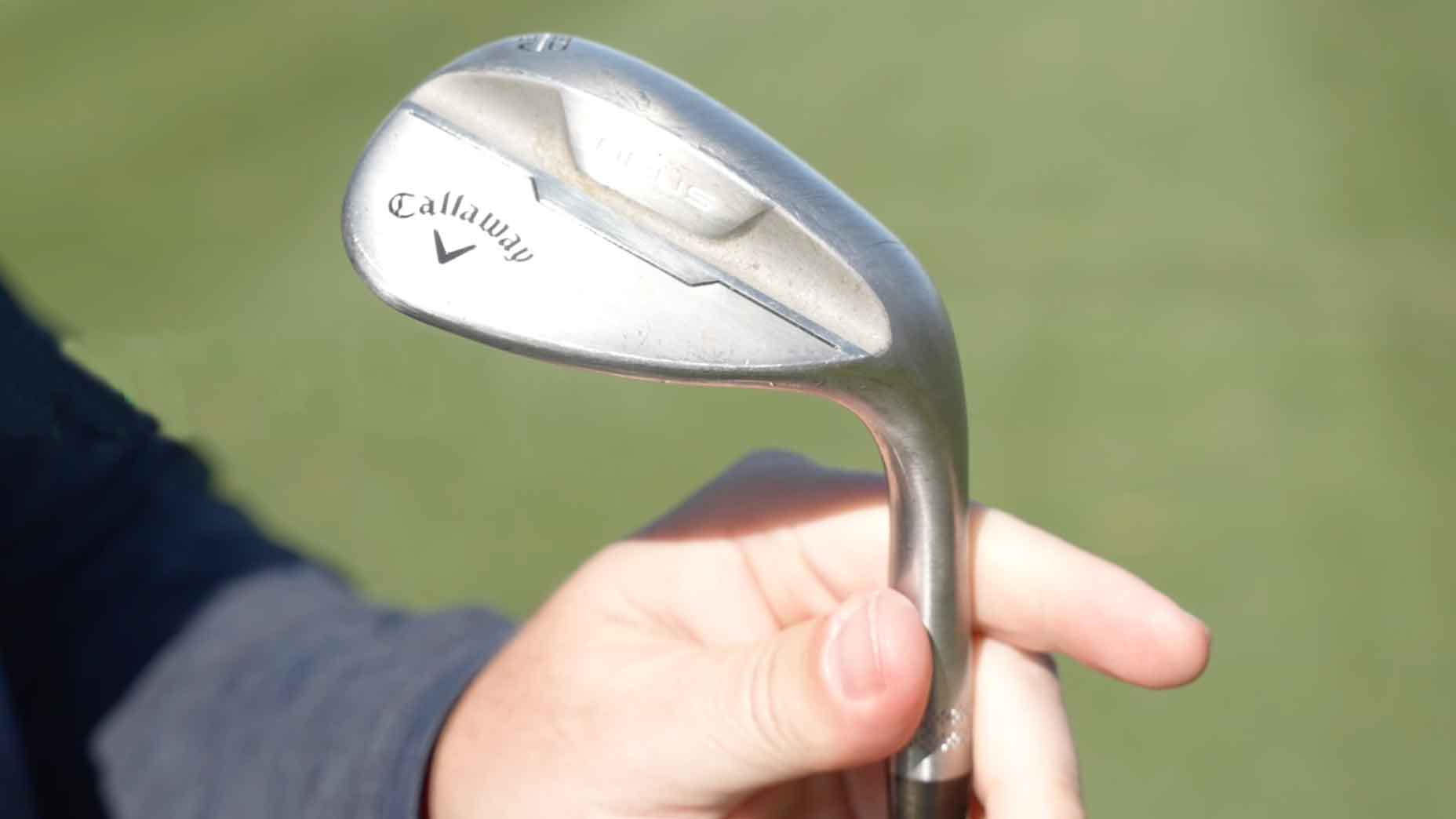 callaway wedge in hand of golfer