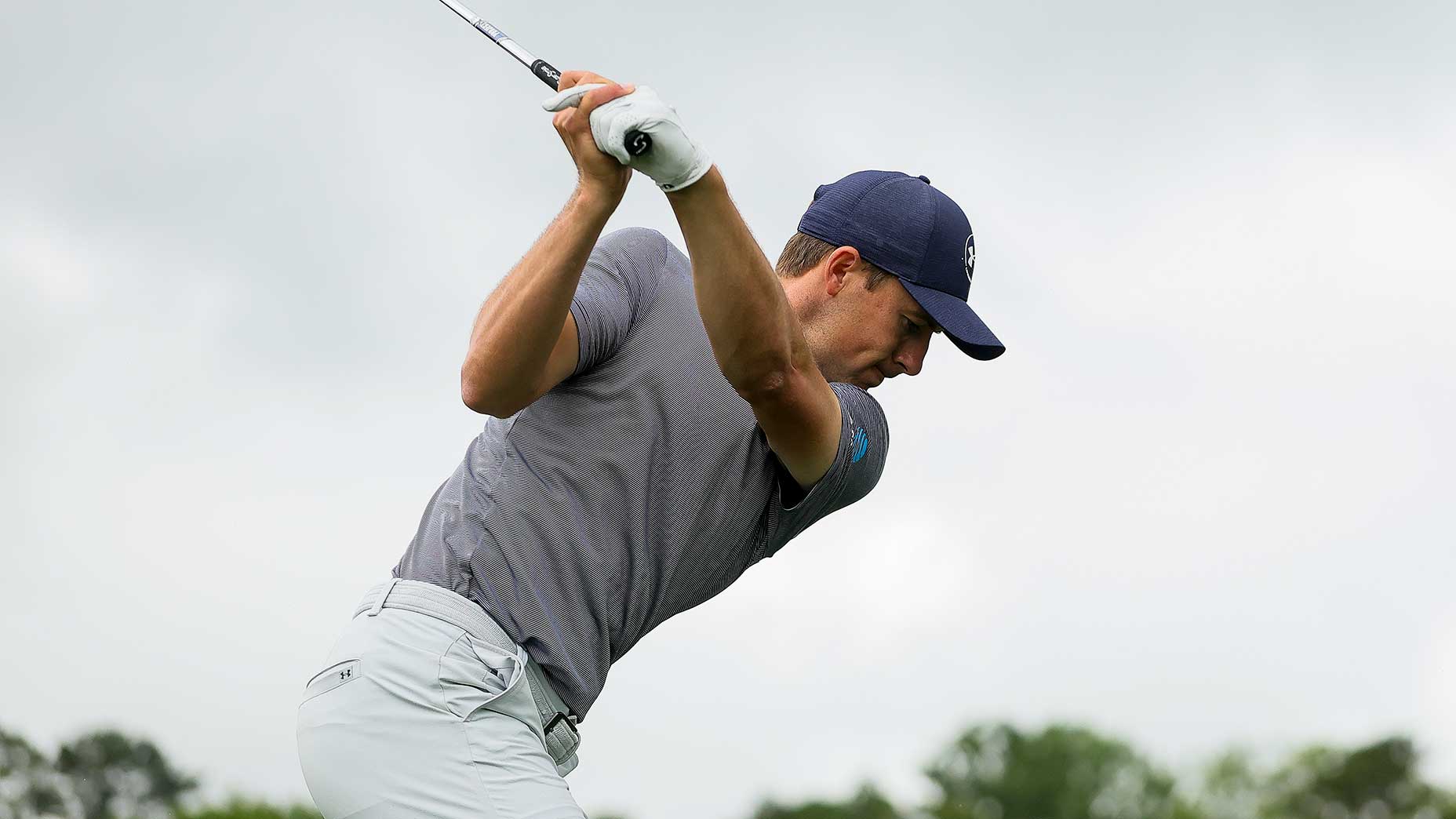 Jordan Spieth hits a shot during a pga championship practice round.