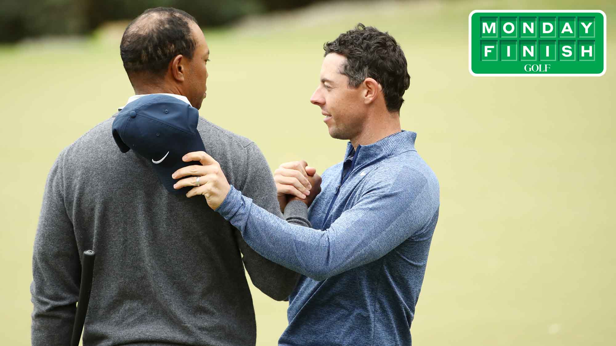 Tiger Woods embraces Rory McIlroy after defeating him 2&1 during the fourth round of the 2019 World Golf Championships-Dell Technologies