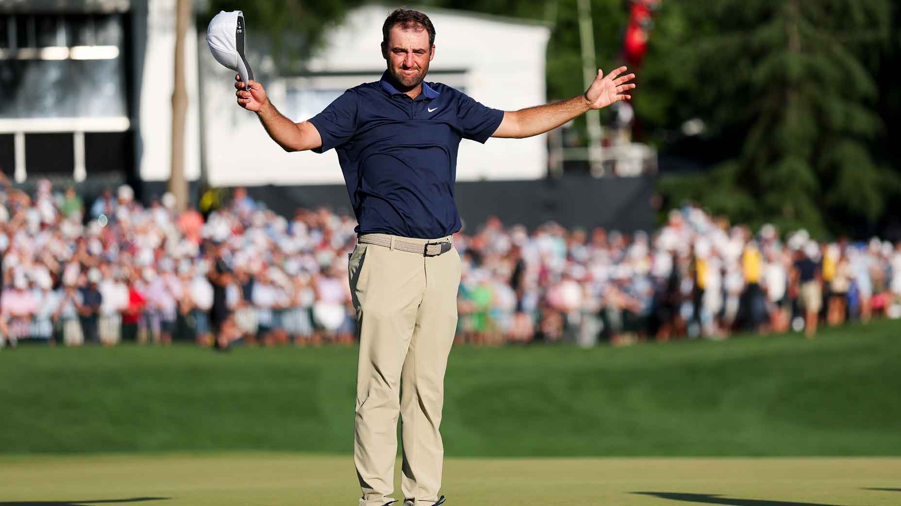 scottie scheffler takes off his cap in celebration at the 2025 pga championship