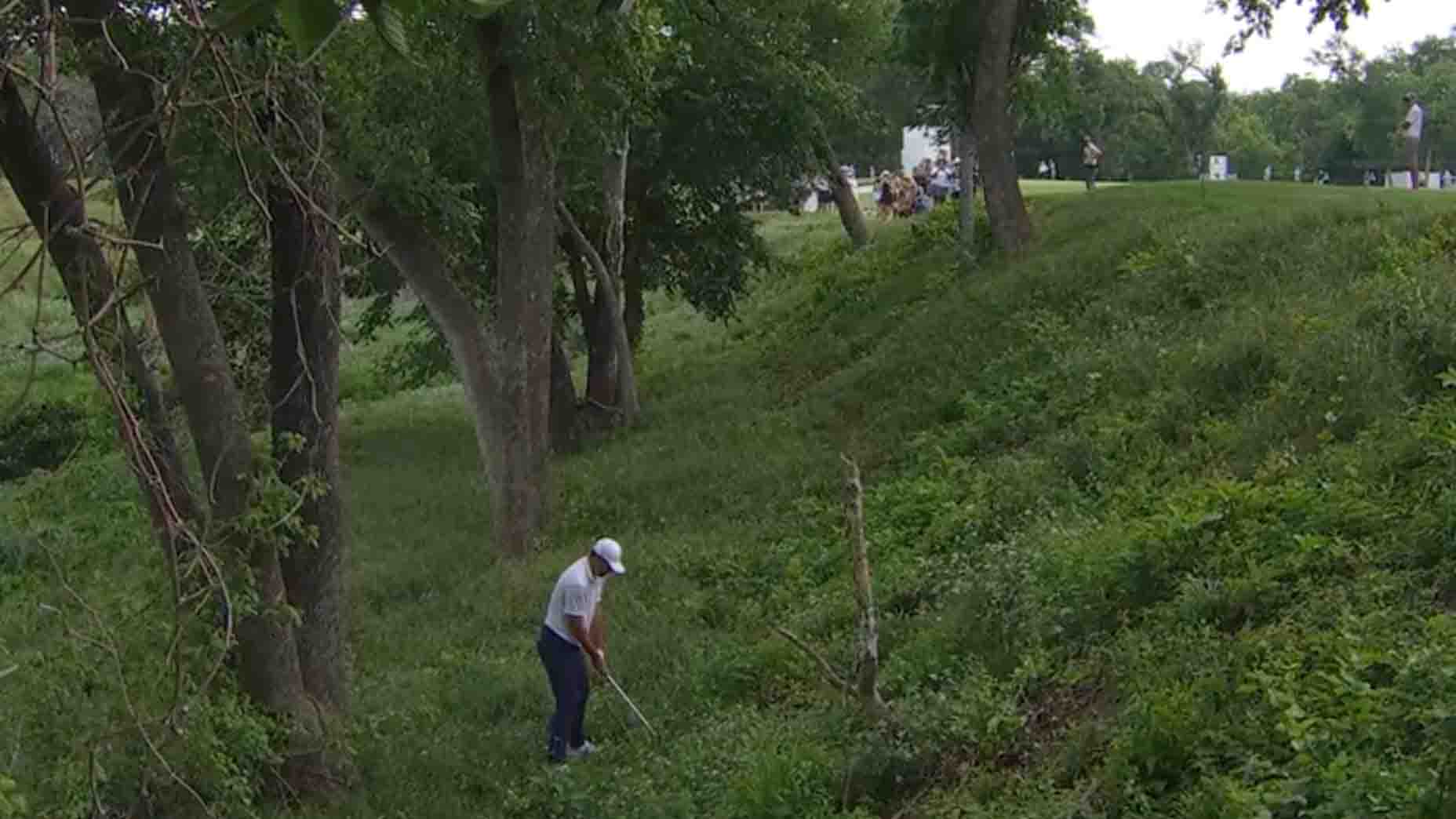 Scottie Scheffler hits a shot during the third round of the Charles Schwab Challenge
