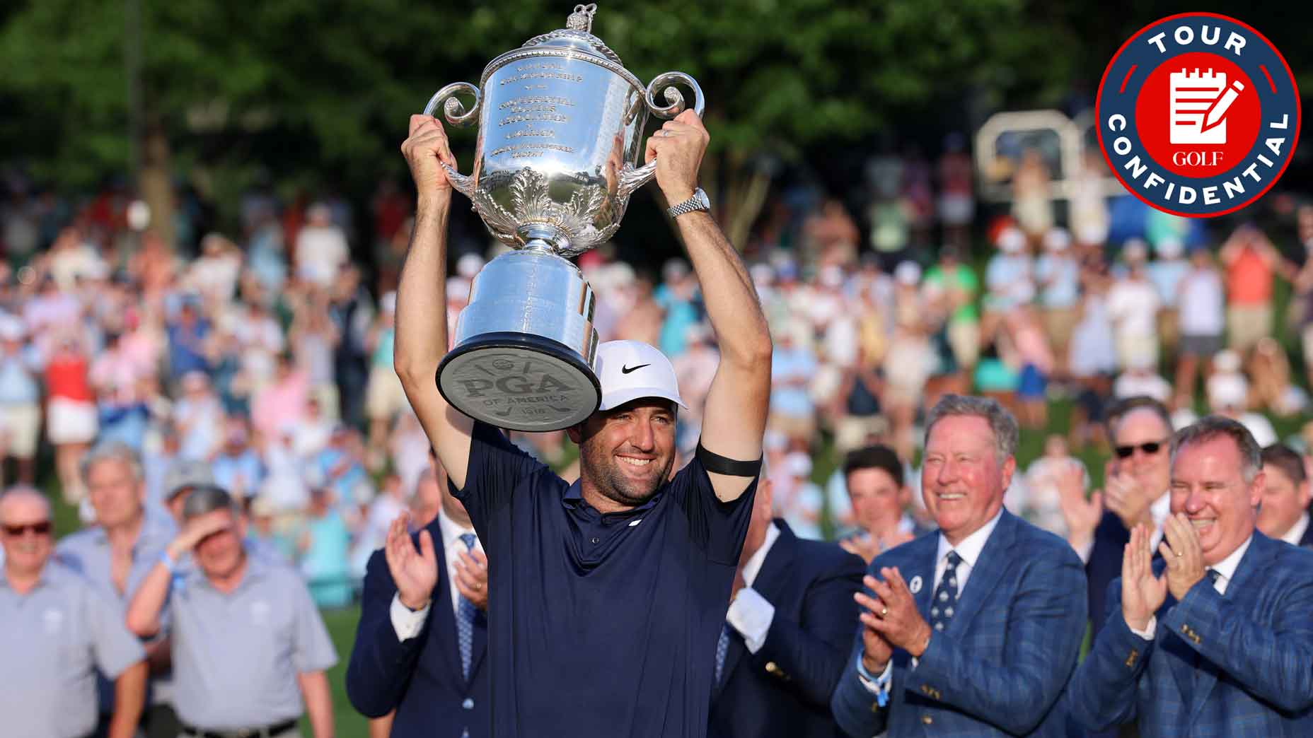 scottie scheffler holds the wannamaker trophy high over his head after winning the 2025 pga championship