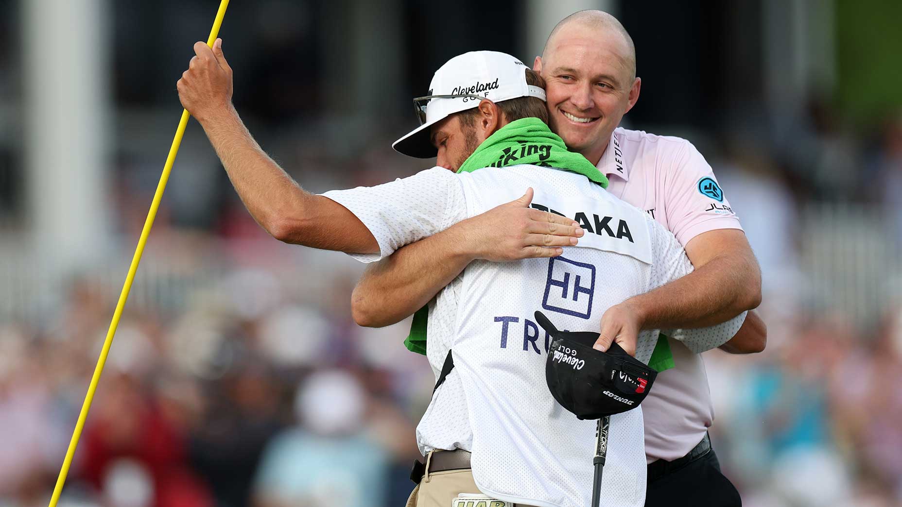 Sepp Straka and caddie Drew Mathers huge after Straka won the Truist Championship at Philadelphia Cricket Club on Sunday.