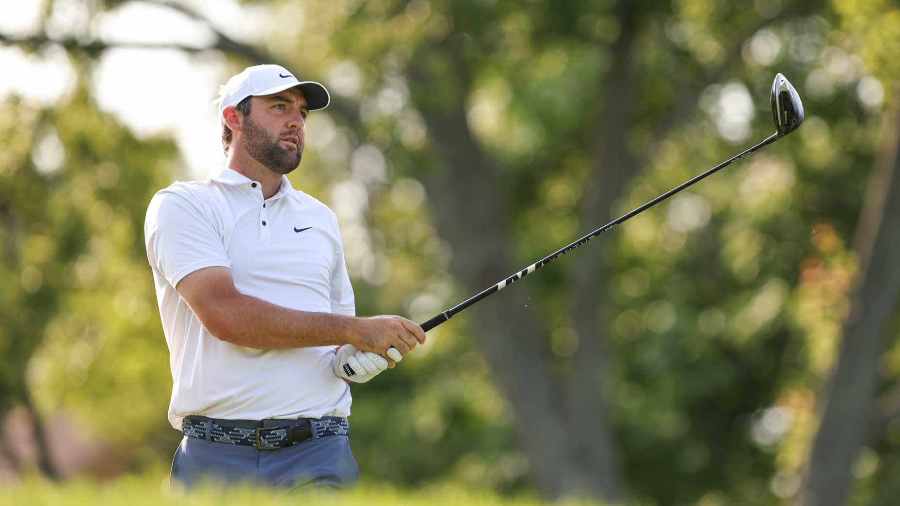 Scottie Scheffler watches a tee shot at the Memorial.