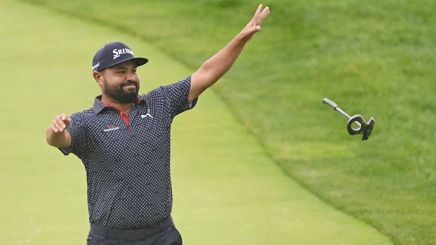 J. J. Spaun tosses his putter after winning the U.S. Open.