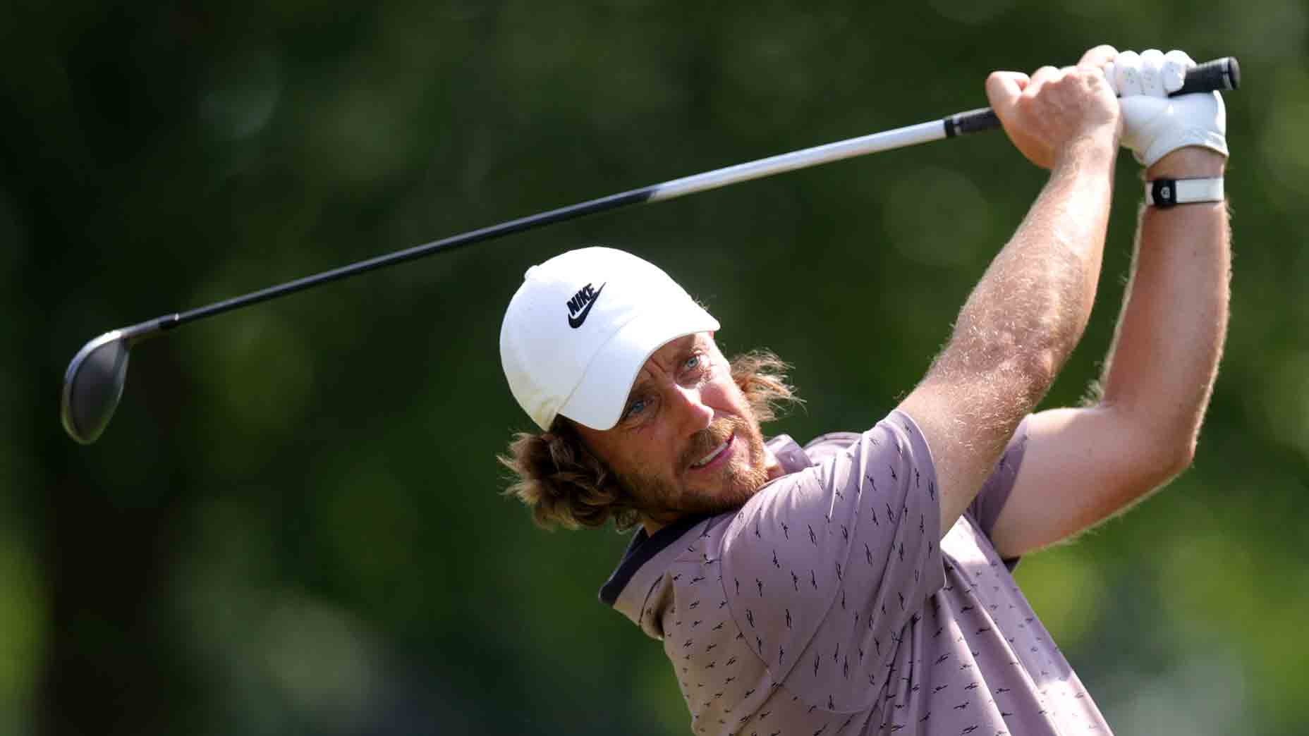 Tommy Fleetwood, co-leader at 2025 Tour Championship, hits drive at previous PGA Tour event.