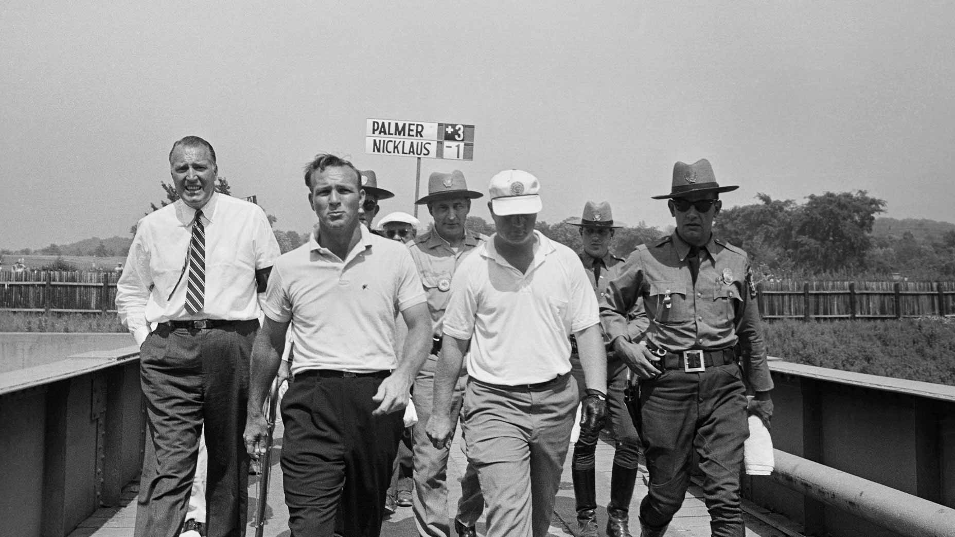 arnold palmer and jack nicklaus walk across the highway at Oakmont in the U.S. Open